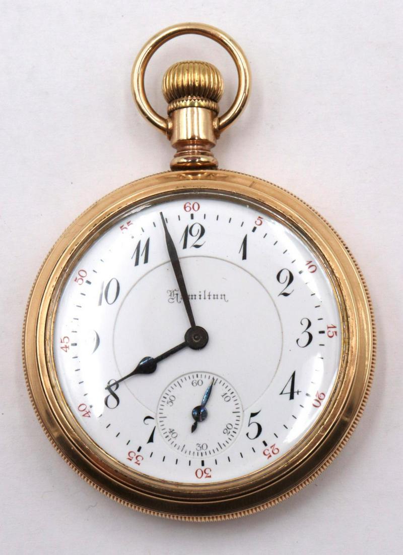 Hamilton Gold Filled Pocket Watch: Hamilton Gold Filled Pocket Watch. 25 year case-heavy plating. Grade 972, 16 size 1912, double roller, adjusted 5 positions, 17 J, triple sunk porcelain dial, excellent condition, railroad grade.