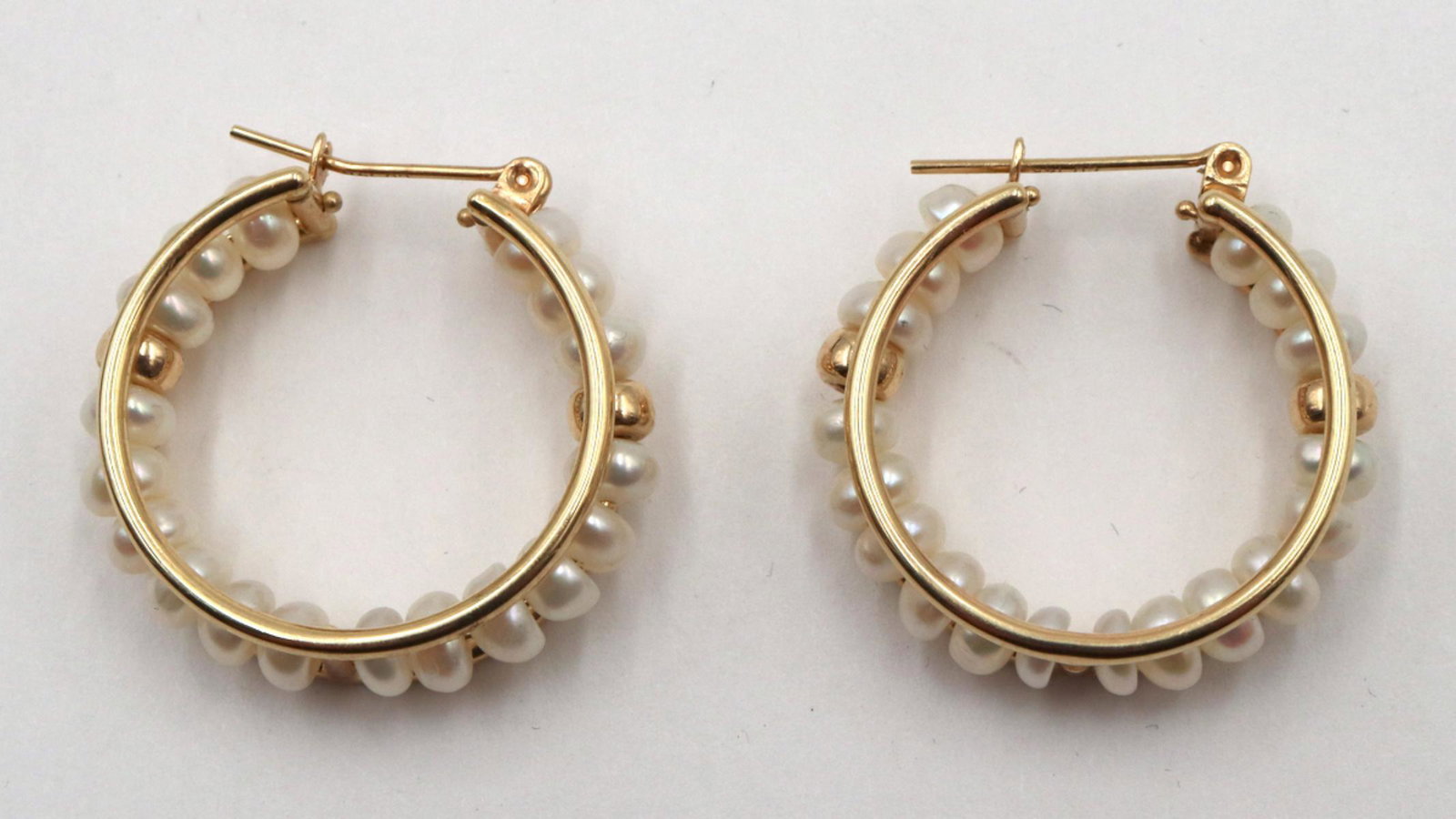 14Kt Yellow Gold Pearl Hoop Earrings: 14Kt Yellow Gold Pearl Hoop Earrings. Weight - 4.1 dwt.