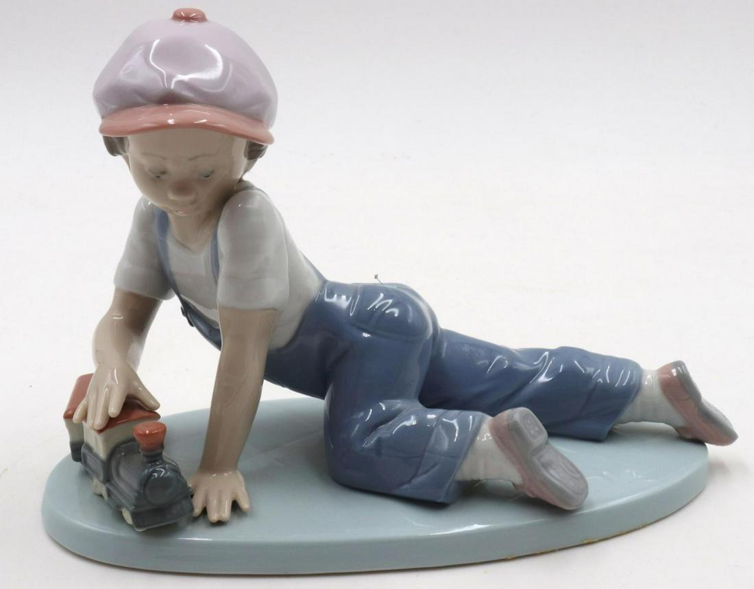 Lladro "All Aboard" #7619 Porcelain Figure (1 of 2)