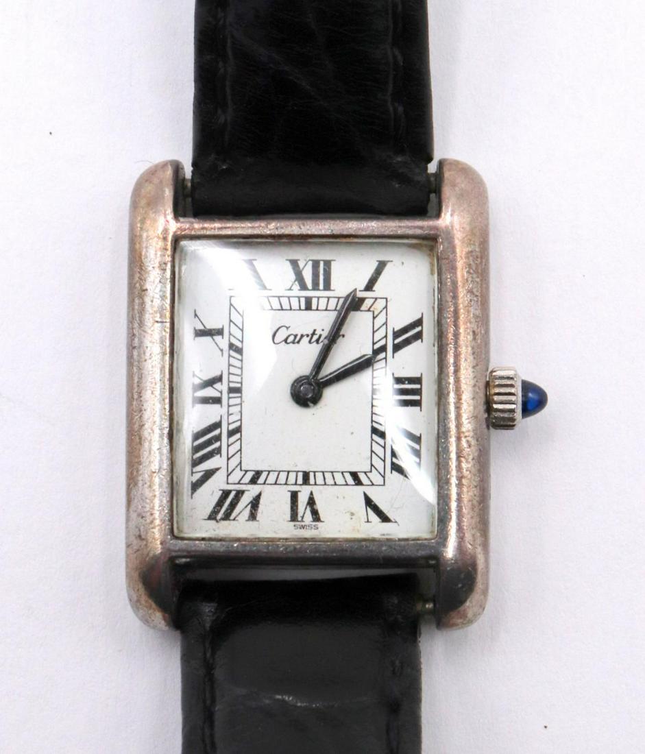 Vintage Cartier "Tank" Sterling Women's Watch: Vintage Cartier "Tank" Sterling Silver Women's Watch. With black leather band.