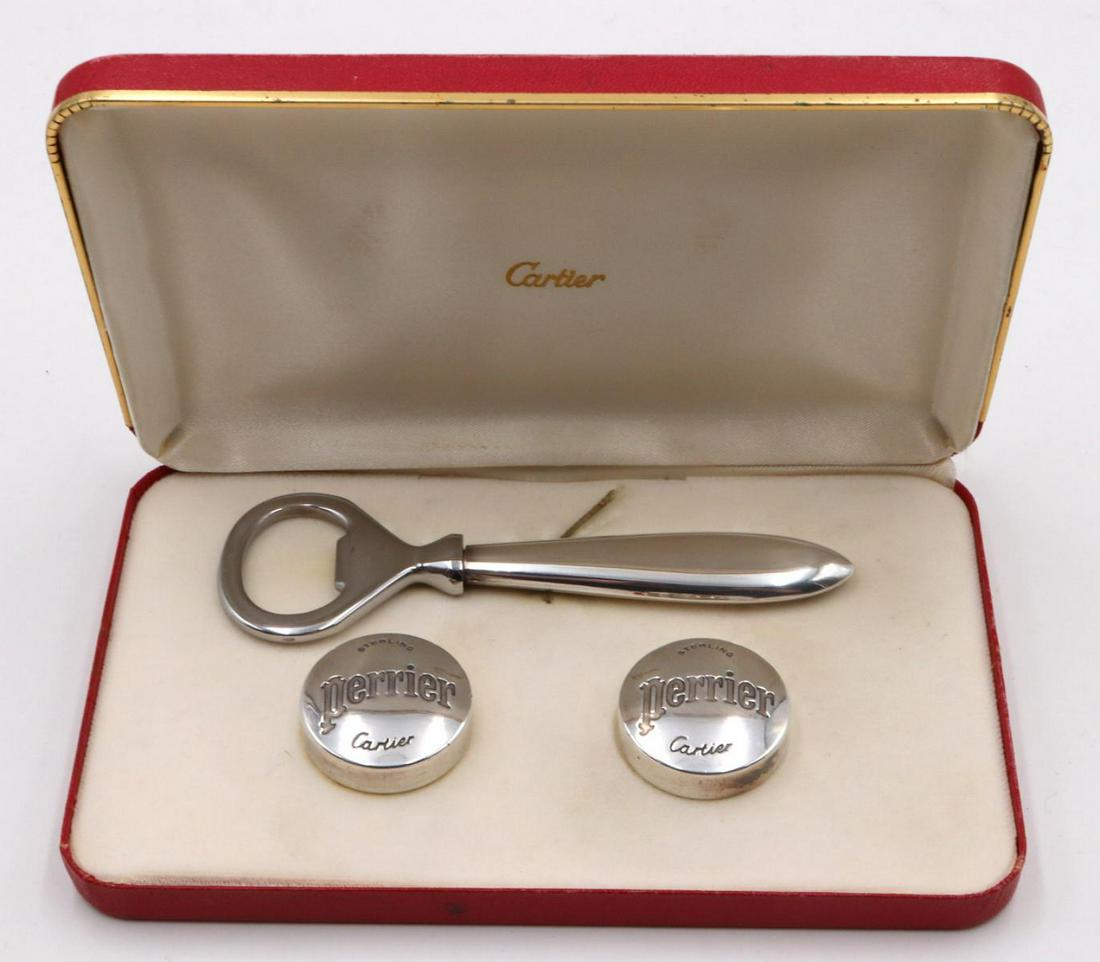 Vintage Cartier Sterling Bottle Opener & Caps: Vintage Cartier Sterling Bottle Opener & Caps. With original fitted box. Opener - 5 1/8" long. Caps - 1 1/4" diameter.