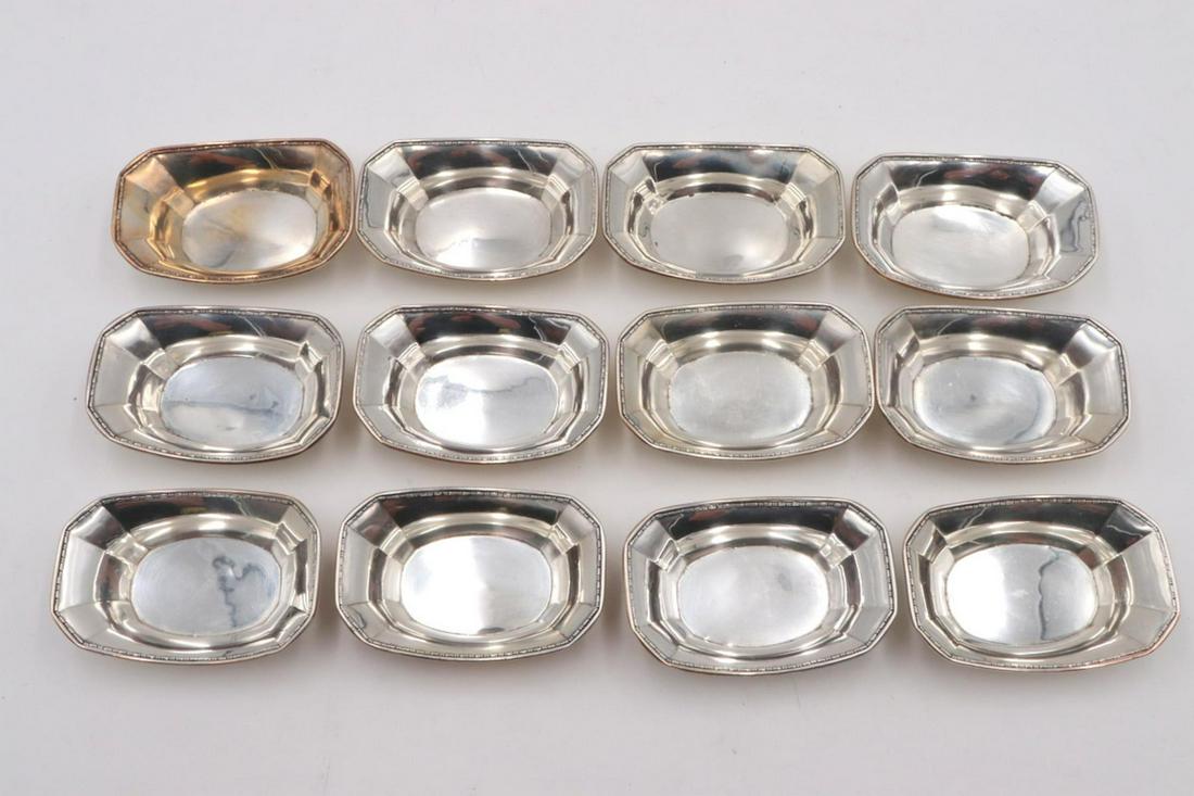 12 Pc. Webster Sterling Silver Salt Cellars: 12 Pc. Webster Sterling Silver Salt Cellars. Measures approx. - 3 1/8" long. Weight - 5.66 troy oz.