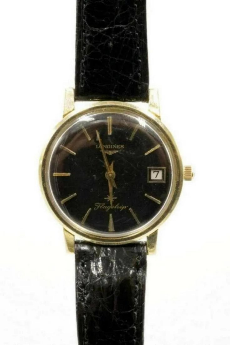 Longines 14Kt "Flagship" Men's Watch: Longines 14Kt Yellow Gold "Flagship" Men's Black Dial Watch. With black leather band. Measures - 9 1/4" long.