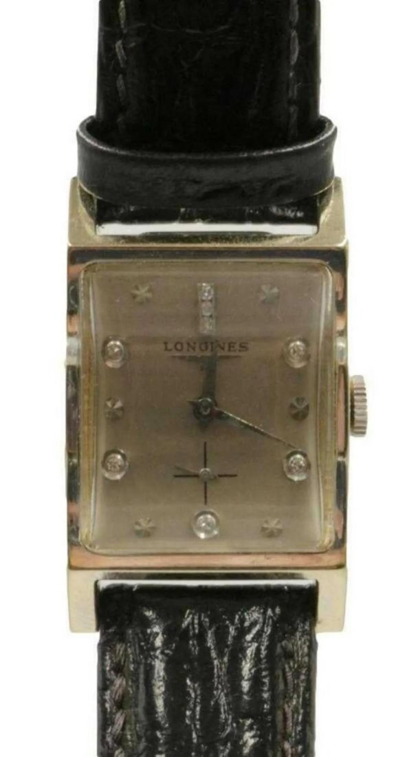 Rare Longines 14Kt Diamond Men's Watch: Rare Longines 14Kt White Gold Diamond Men's Watch. With black leather band. Measures - 8 1/2" long.
