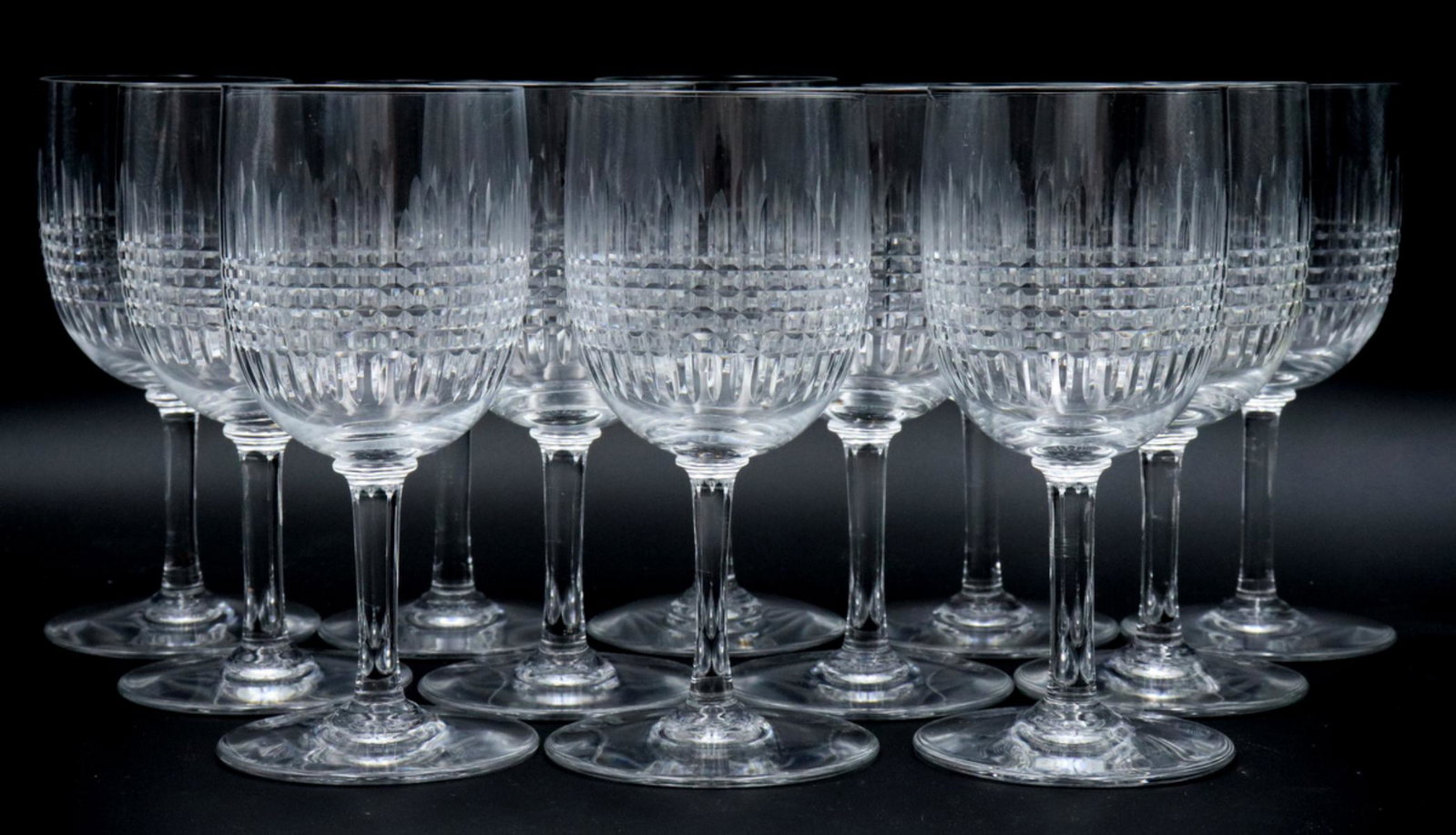 12 Pc. Baccarat "Nancy" Crystal Wine Glasses: 12 Pc. Baccarat "Nancy" Crystal Claret Wine Glasses. Measures approx. - 5 5/8" high x 2 3/4" diameter.