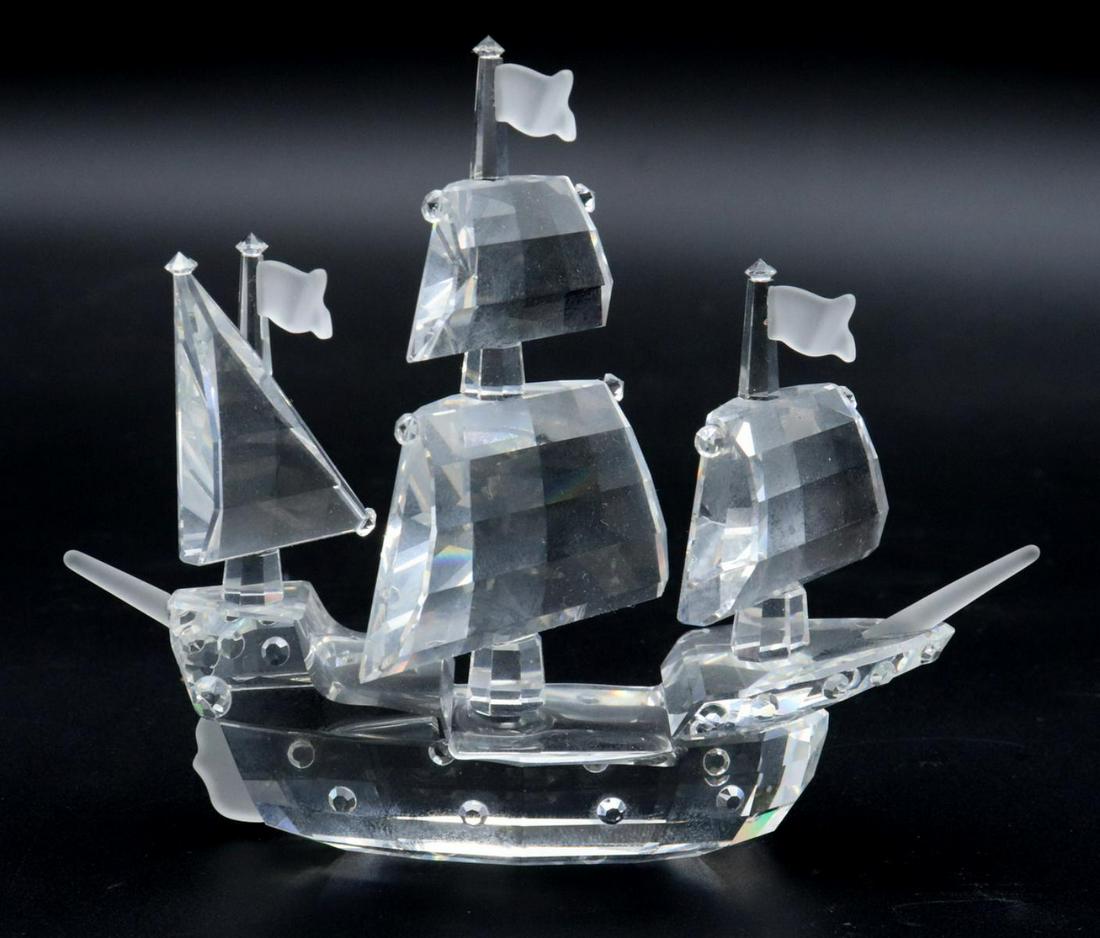 Swarovski Crystal Ship Sculpture: Swarovski Crystal Ship Sculpture. Measures approx. - 3 1/2" high x 4 1/2" wide. With original box.