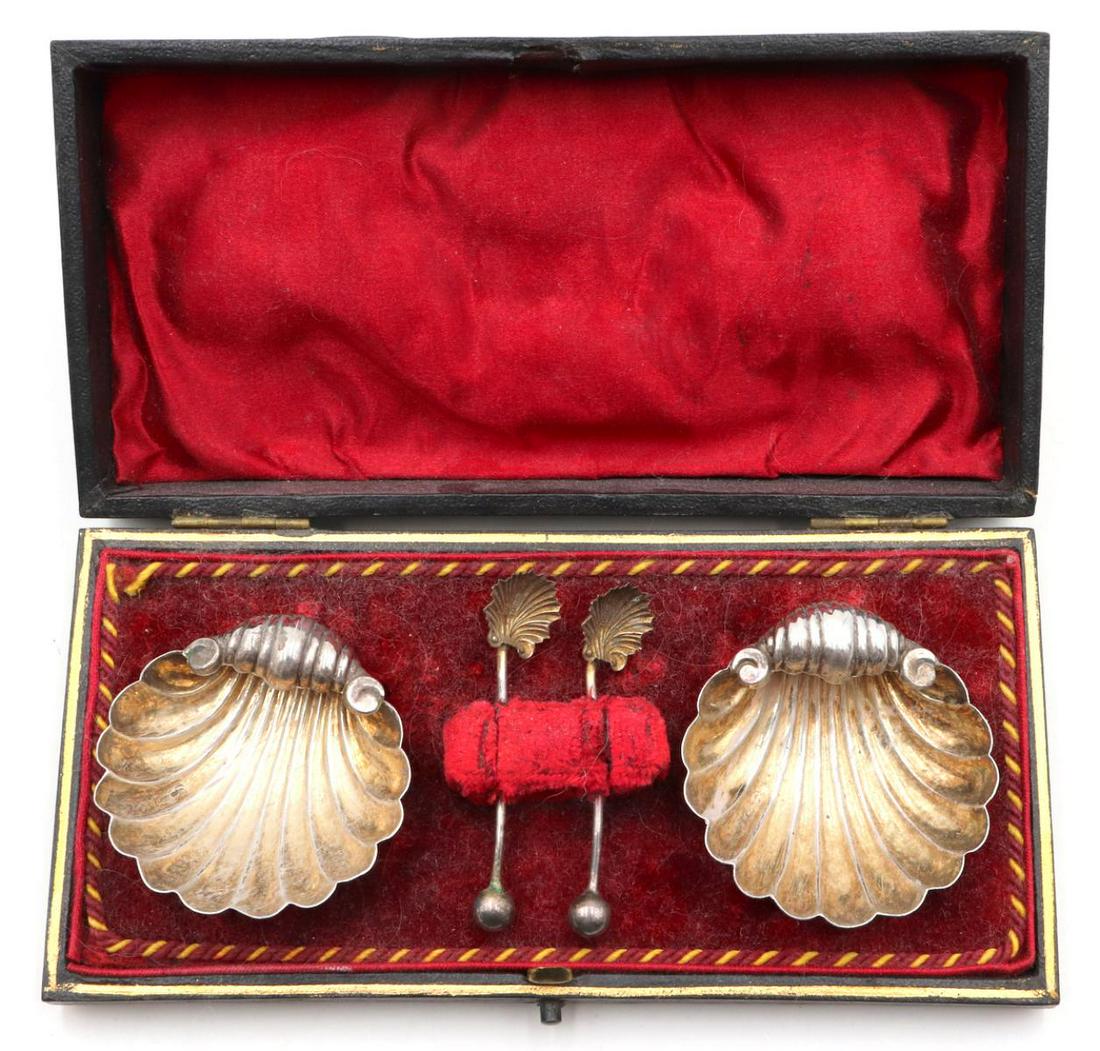 Antique Shell Motif Sterling Silver Salt Cellars: Antique Shell Motif Sterling Silver Salt Cellars. With original fitted box. Measures approx. - 1 1/2" high x 6" long. Weight - 19.8 grams.