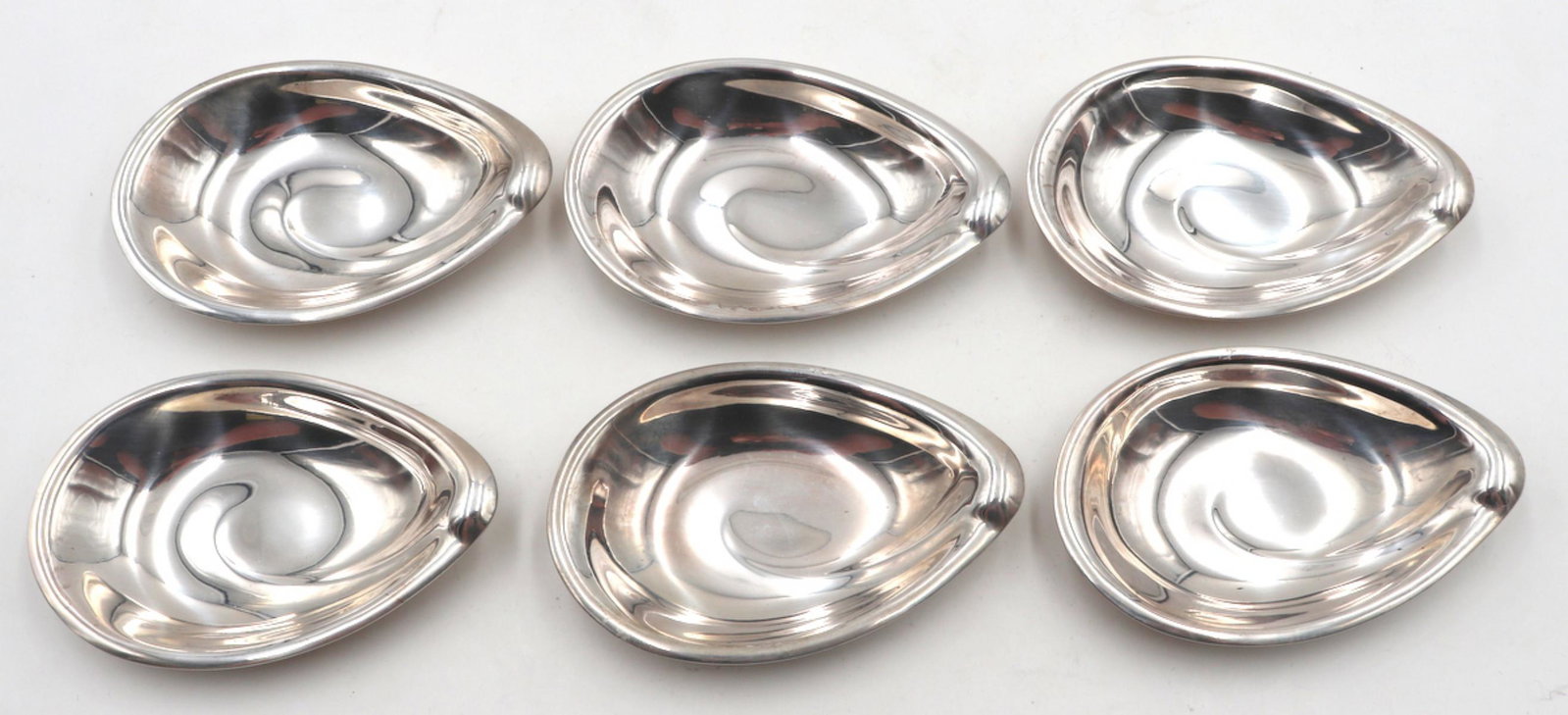6 Pc. Reed & Barton "Silver Sculpture" Sterling Salt Cellars: 6 Pc. Reed & Barton "Silver Sculpture" Sterling Silver Salt Cellars. Measures approx. - 3 1/2" long x 2 1/4" wide. Weight - 4.345 troy oz.