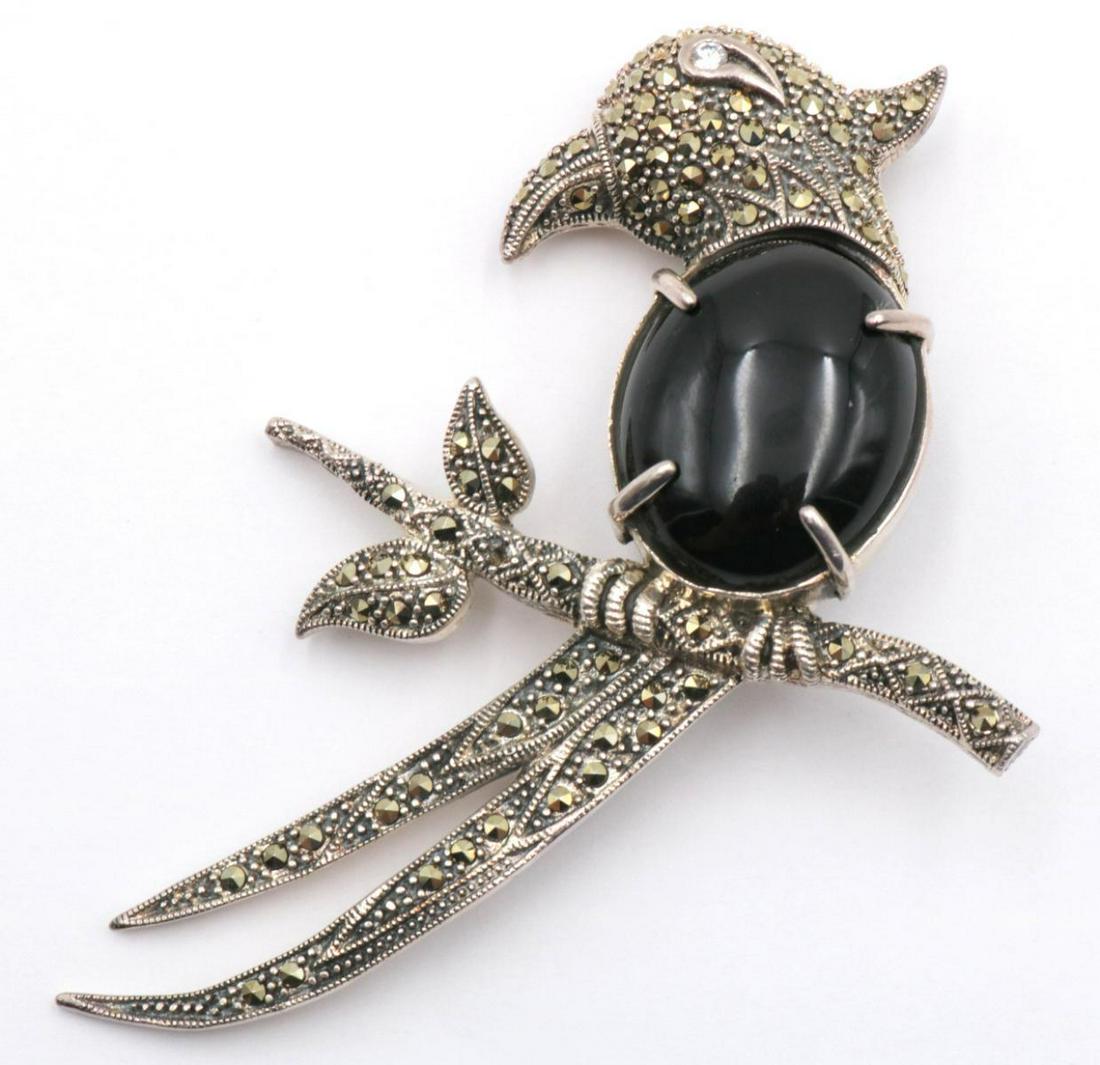 Large Marcasite & Onyx Sterling Bird Brooch: Large Marcasite & Onyx Sterling Silver Bird Brooch. Measures - 3 3/4" long. Weight - 33.6 grams.