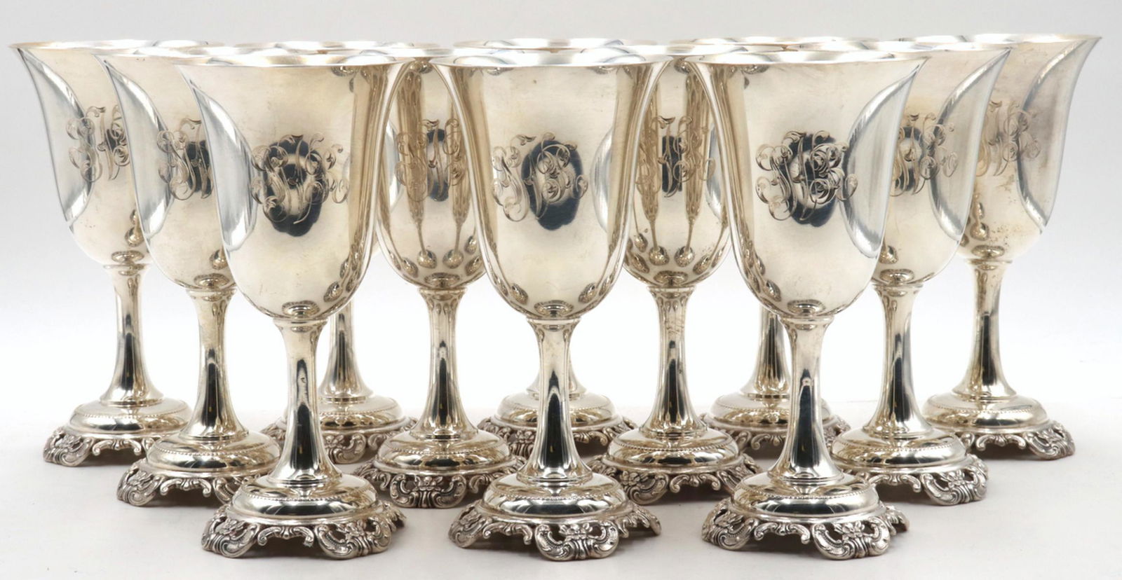 Rare 12 Wallace "Grande Baroque" Sterling Silver Goblets: Rare 12 Pc. Wallace "Grande Baroque" Sterling Silver Goblets. Measures approx. - 7" high x 3 5/8" diameter. Total approx. weight - 82.56 troy oz. Monogrammed.