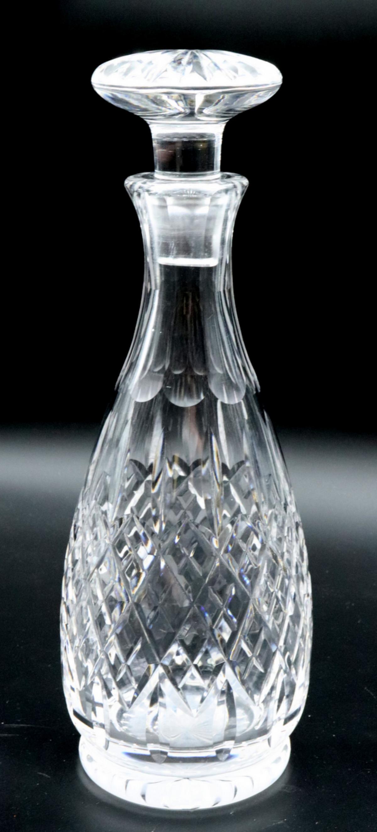 Stuart Crystal Decanter: Stuart Crystal Decanter. Measures approx. - 11 1/2" high x 4 1/4" diameter.