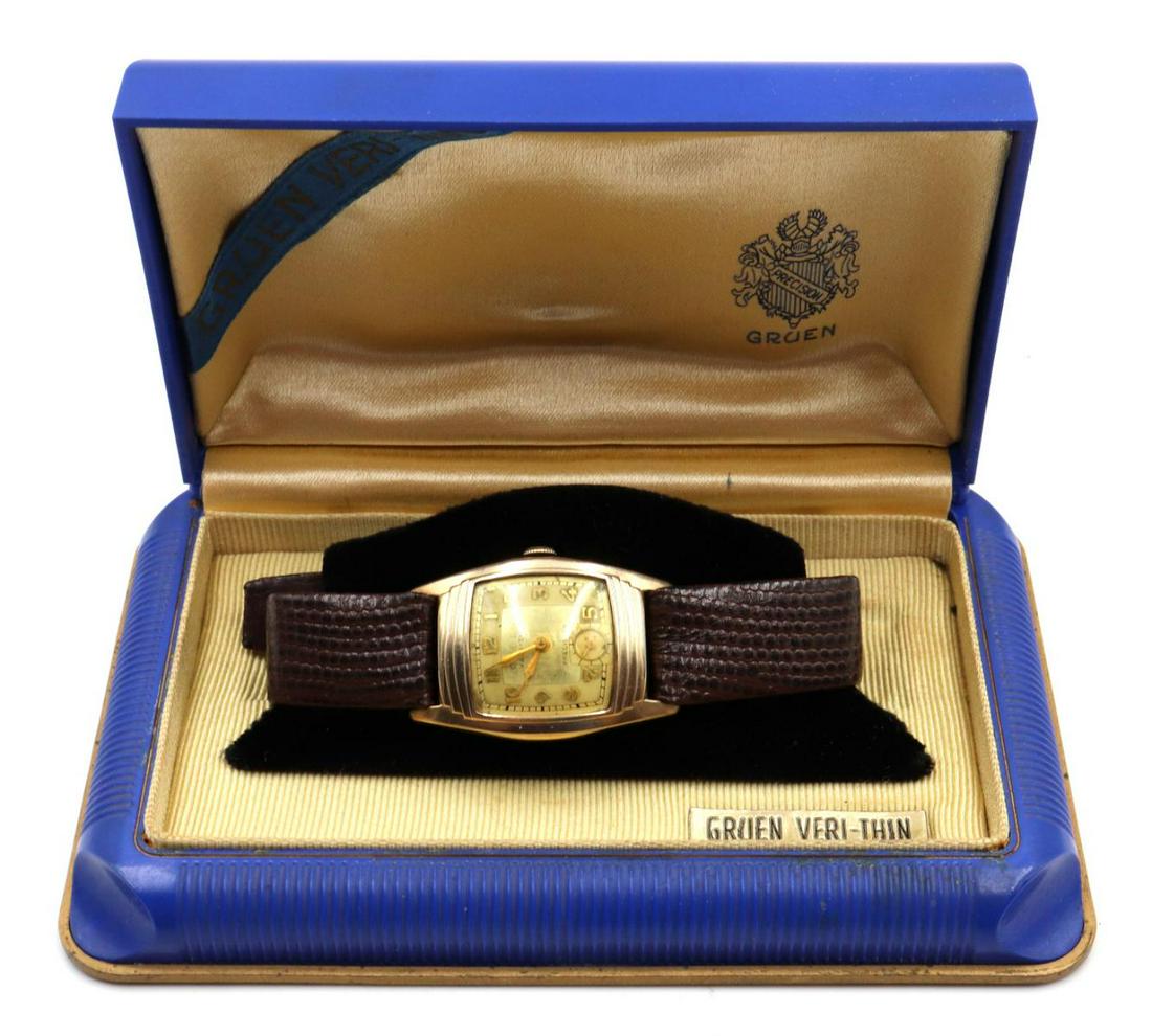 Gruen Veri-Thin 17J Gold Filled Wristwatch: Gruen Veri-Thin 17J Gold Filled Wristwatch. Circa - 1940, two tone dial, step case, high end Kreisler leather strap in original box.