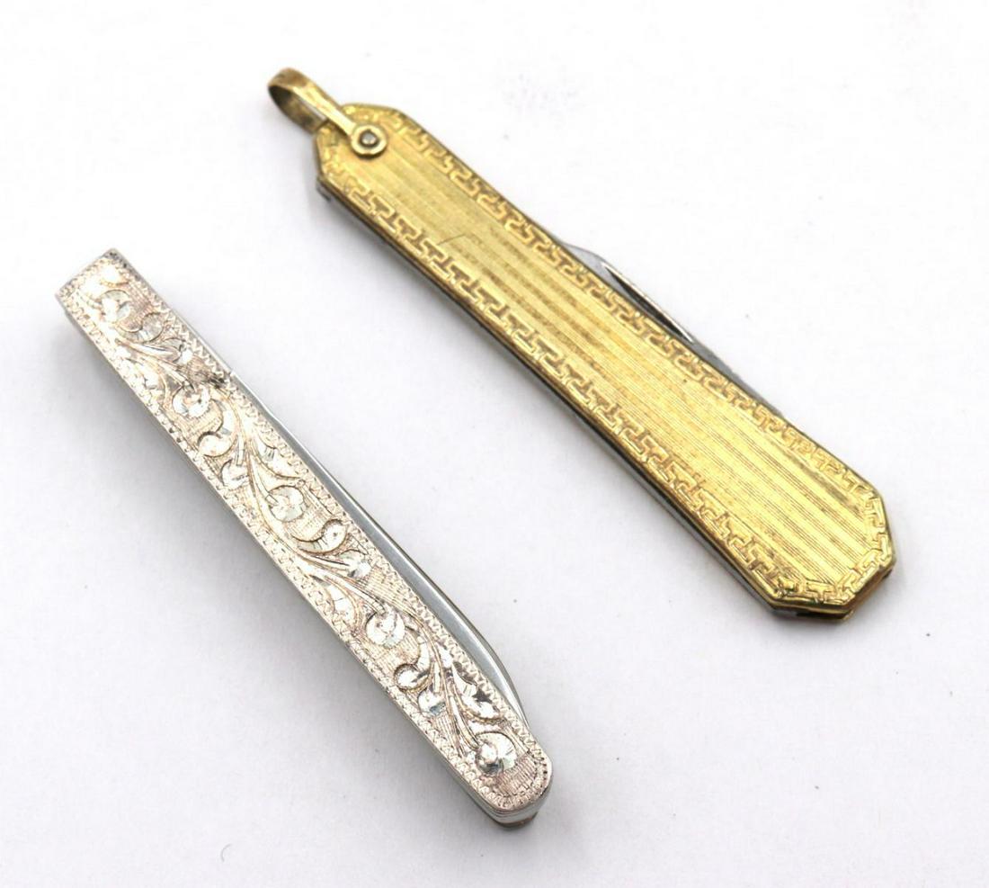 Two Pocket Knives: Two Pocket Knives. One two blade gold filled, the other is sterling silver single blade tie clip knife.