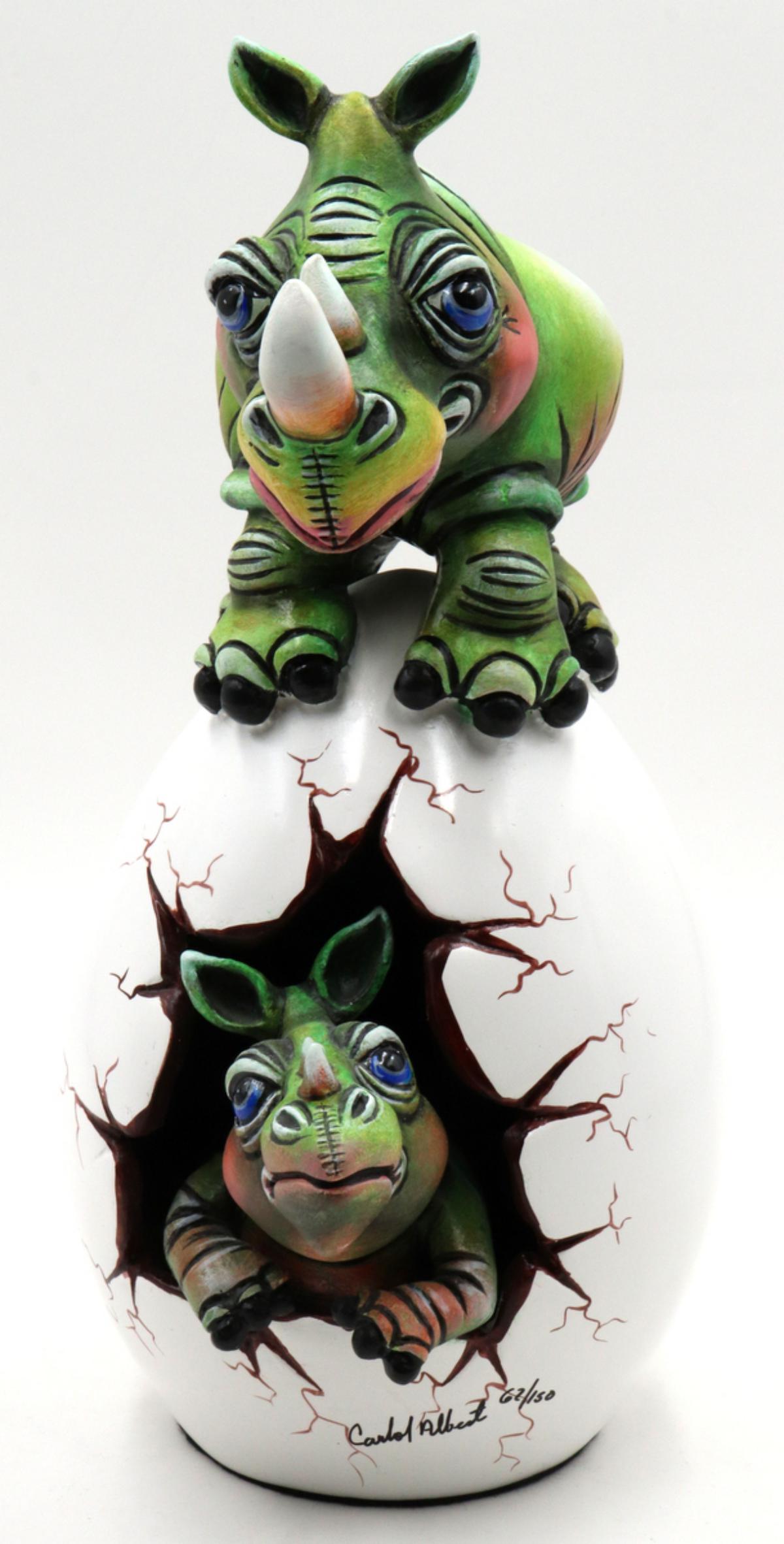 Carlos Albert "Rhino Maternal Egg" Sculpture: Carlos Albert "Rhino Maternal Egg" Mixed Media Limited Edition Sculpture. Numbered - #62/150. Measures approx. - 14" high x 6 3/4" wide x 8 5/8" deep.