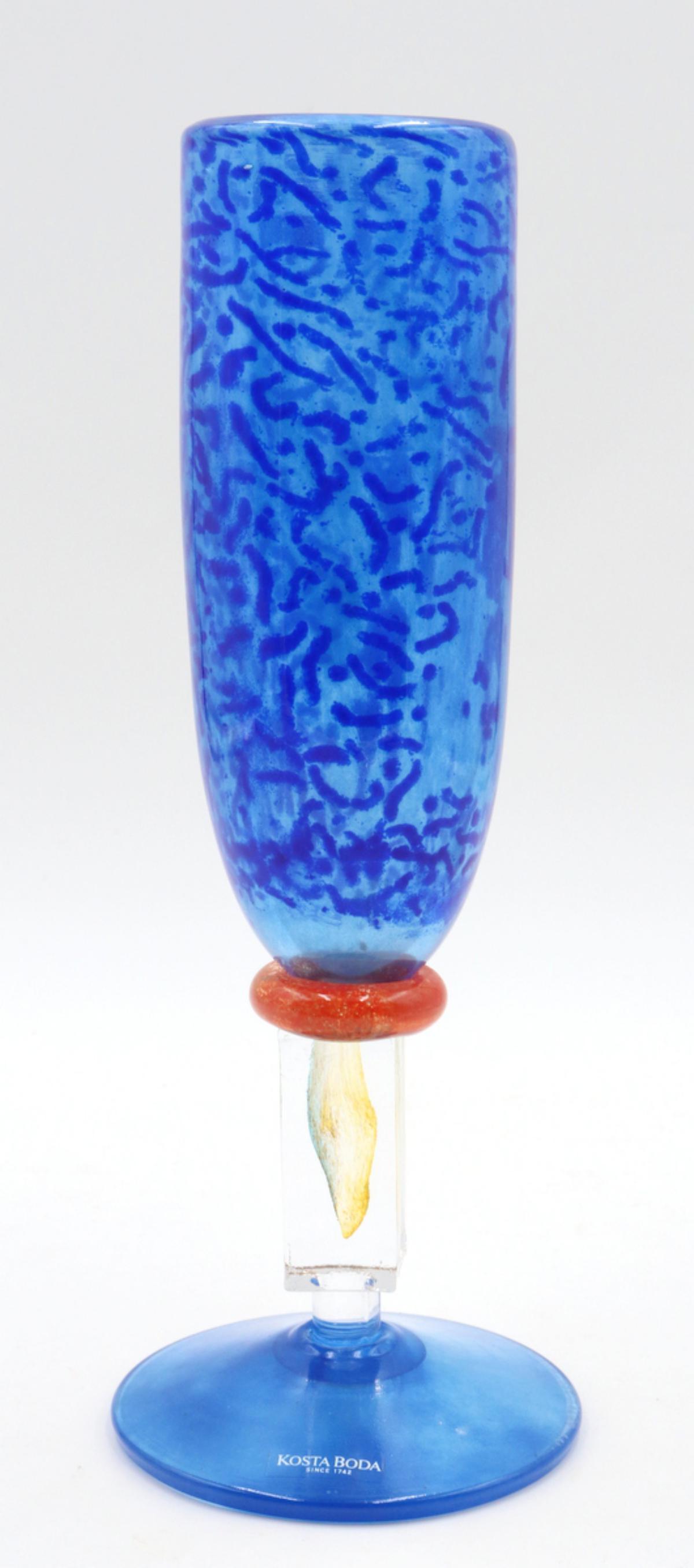 Kosta Boda Large Art Glass Champagne Glass: Kosta Boda Large Art Glass Champagne Glass. #952011. by Kjell Engman. Measures approx. - 9 3/4" high x 3 5/8" diameter.