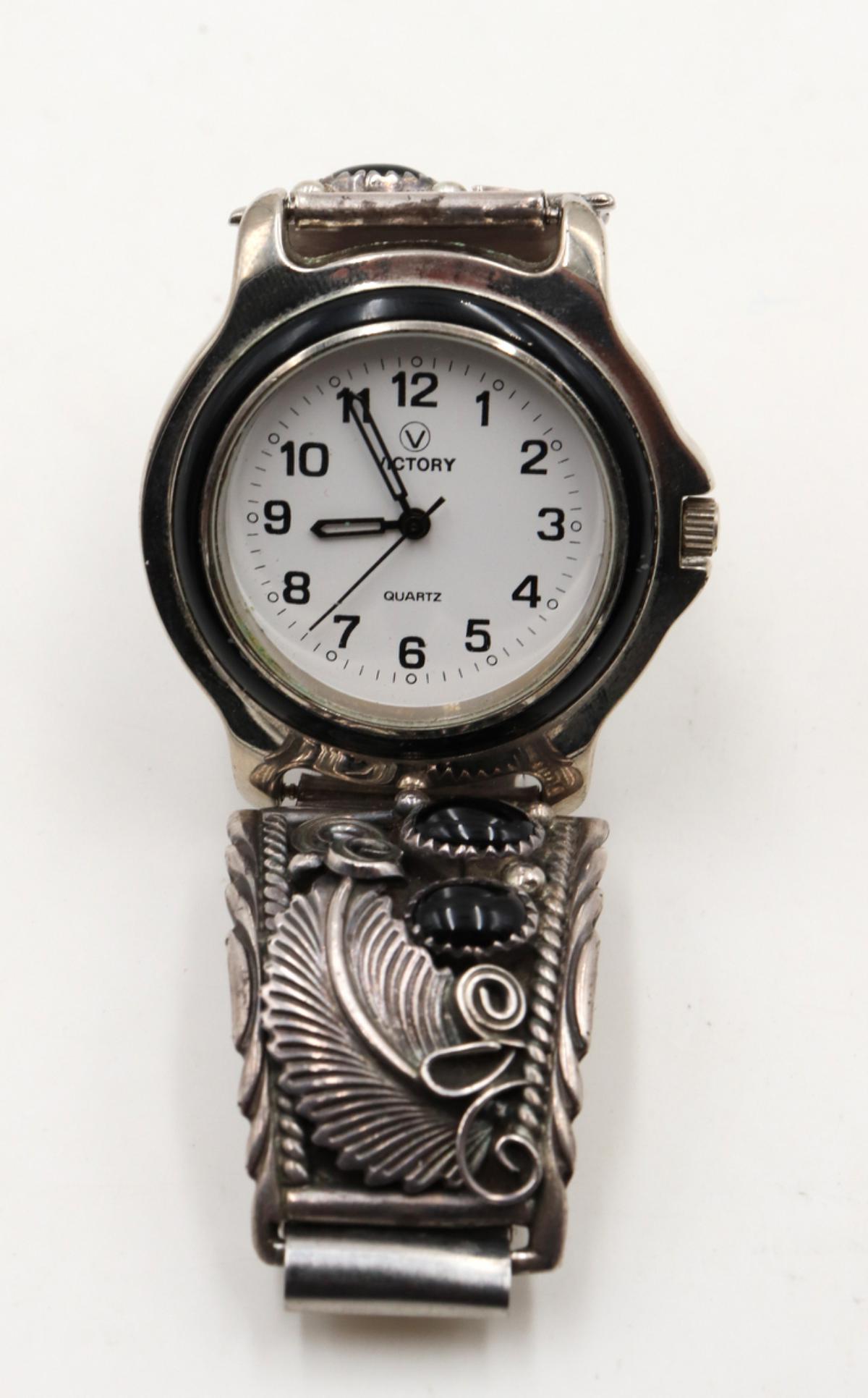 Navajo Native American Sterling Wristwatch: Navajo Native American Sterling Wristwatch. Onyx on band.