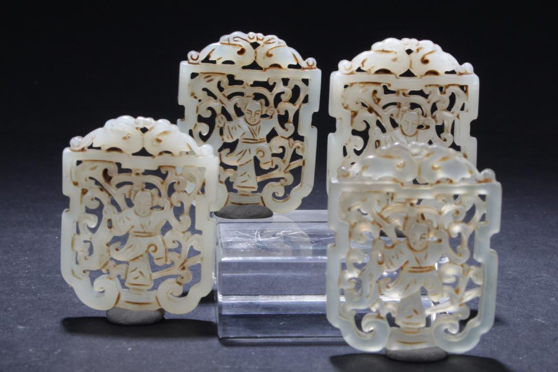 A Set of Four Chinese Jade Pendants (1 of 5)