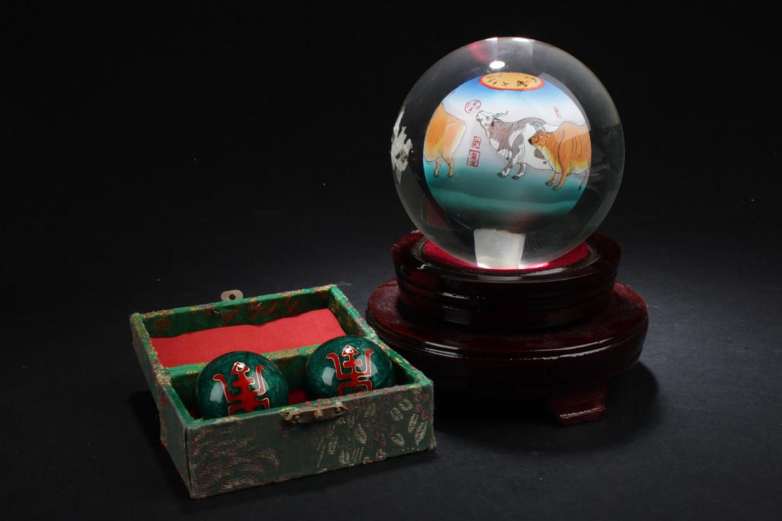 Crystal Ball and Two Cloisonne King Fu Balls: Crystal Ball (comes with wooden stand) and Two Cloisonne King Fu Balls. Diameter: 4.25" (crystal ball) 1.5 " (cloisonne ball)