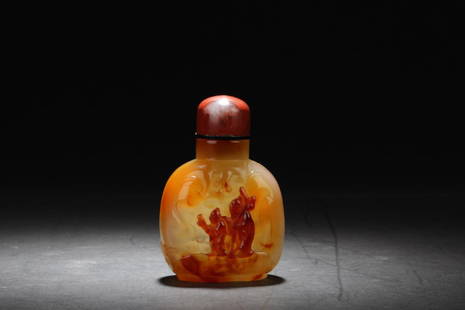 Chinese Agate Snuff Bottle: Chinese Amber Snuff Bottle. Height: 3.25"