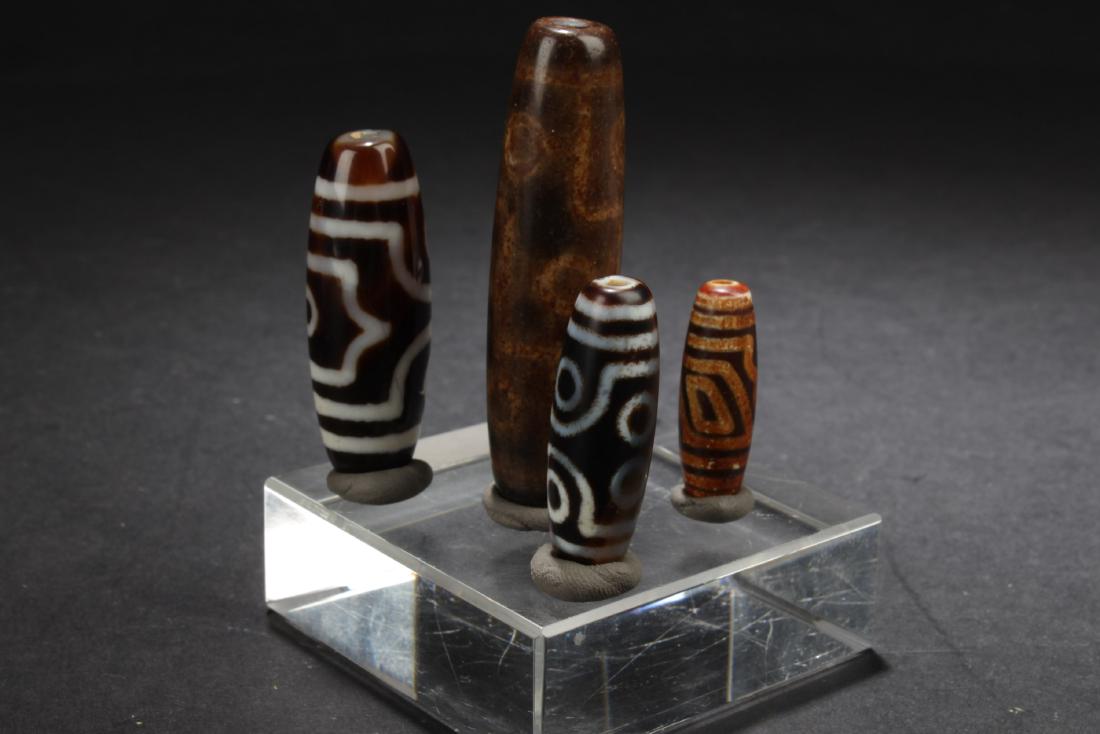 A Group of Four Dzi Beads (1 of 6)