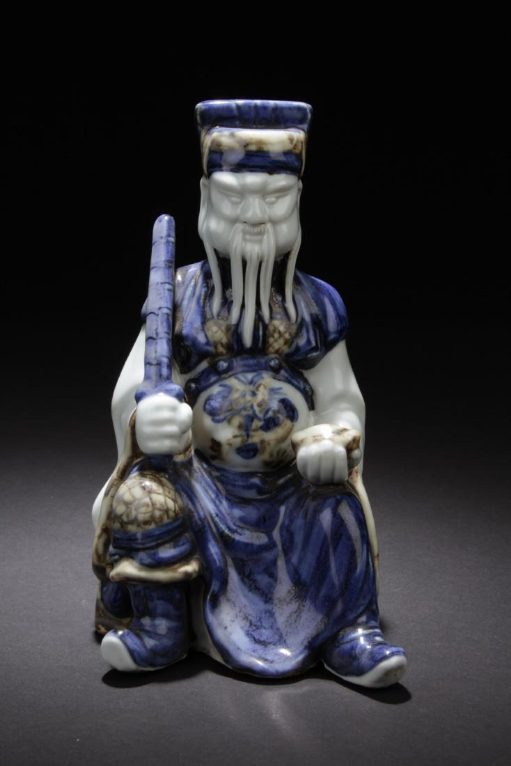 Chinese Porcelain Deity Statue (1 of 5)