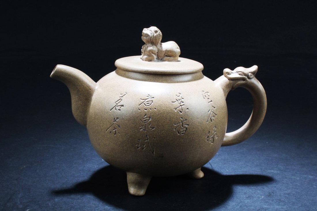 Chinese Zisha Teapot: Chinese Zisha Teapot. Length: 6.75"