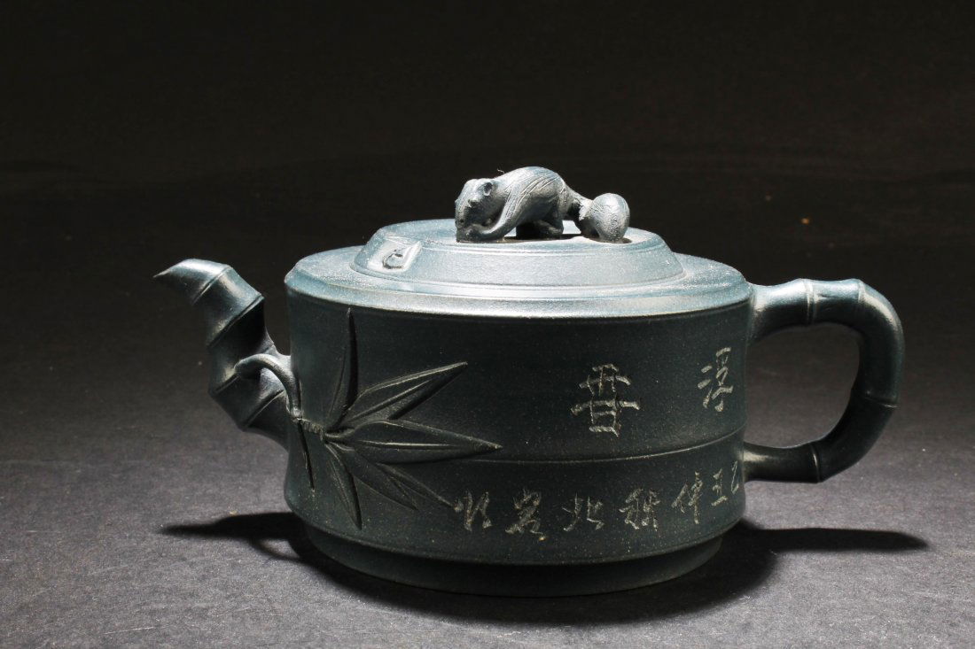 Chinese Zisha Teapot: Chinese Zisha Teapot. Length: 5.75"