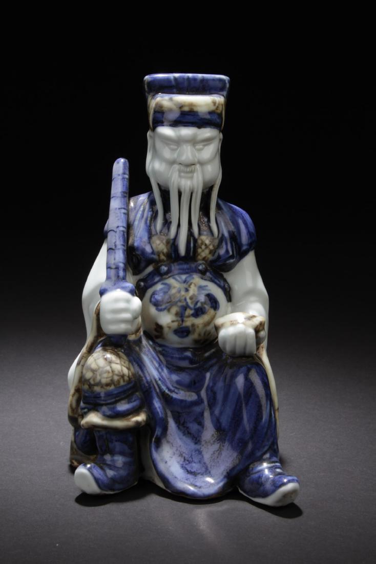 Chinese Porcelain Deity Statue (1 of 5)