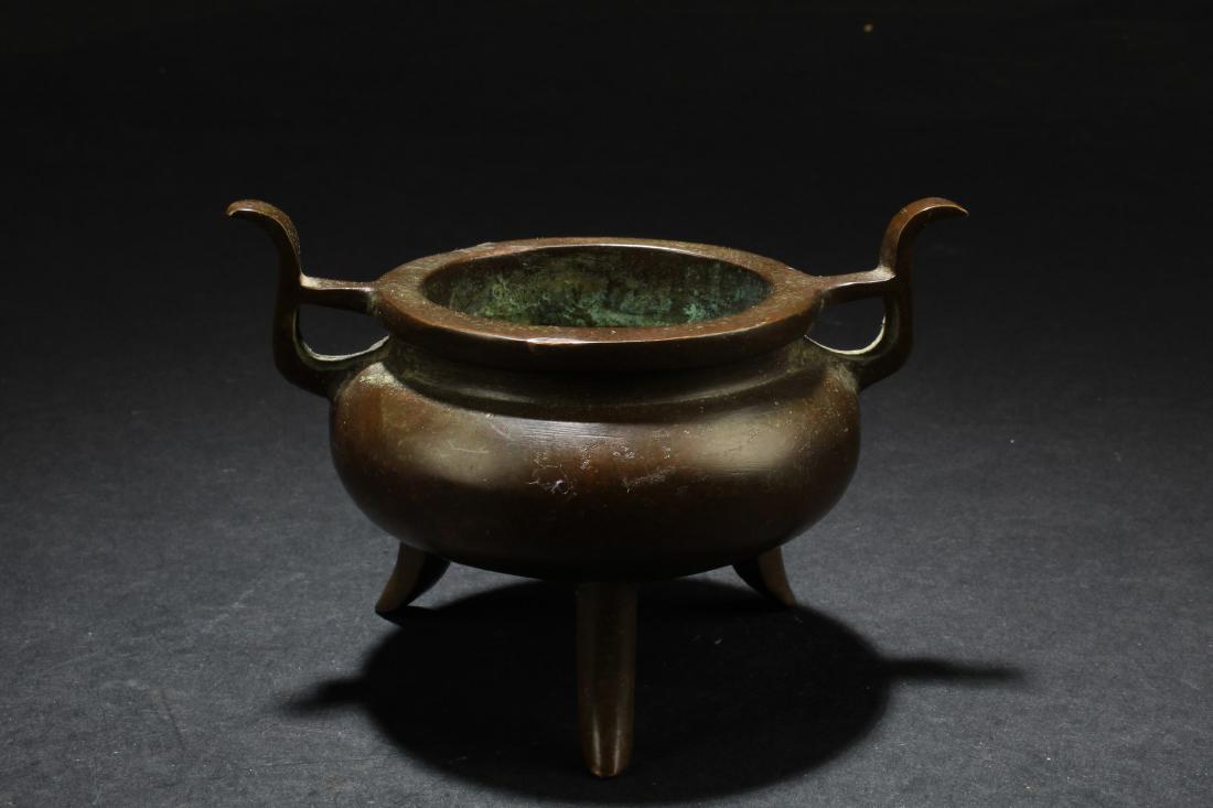 Chinese Bronze Tripod Censer: Chinese Bronze Tripod Censer. Height: 2.5"