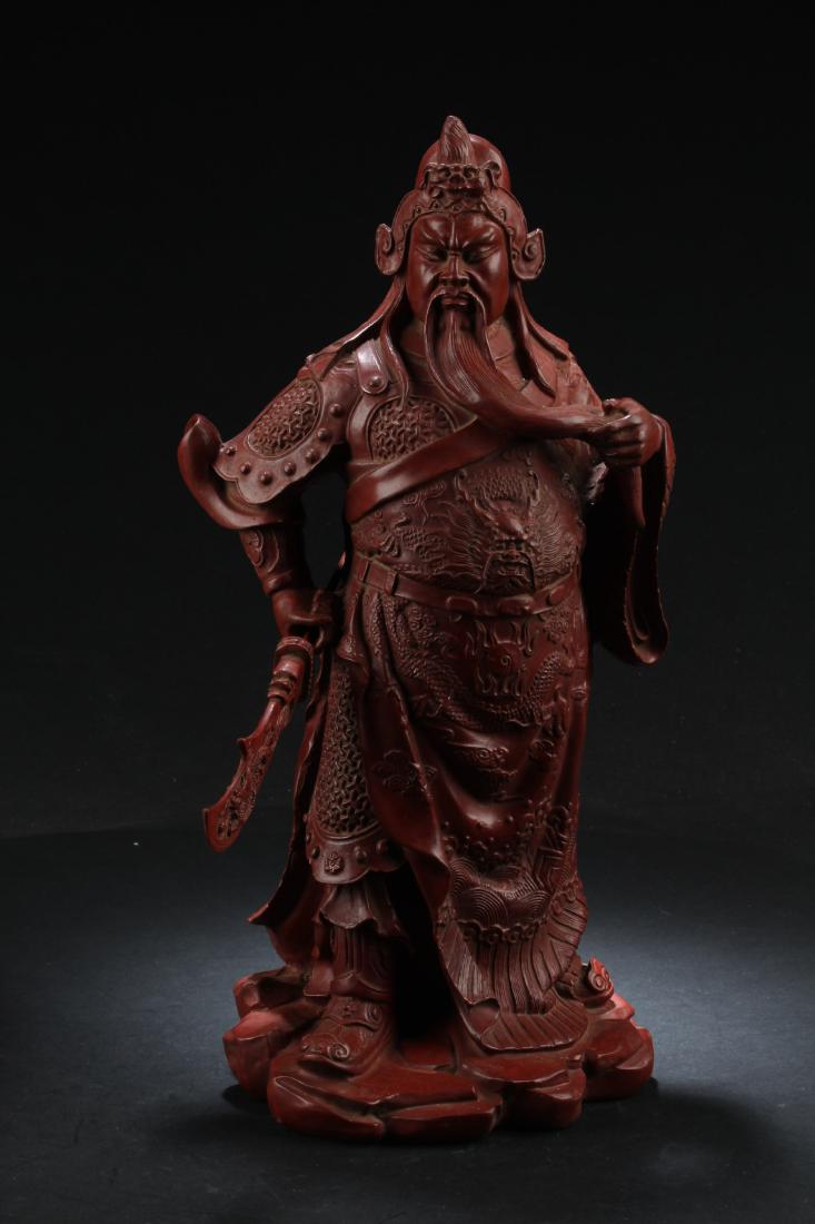 A Chinese Cinnabar Lacquer Guanyu Statue (1 of 5)