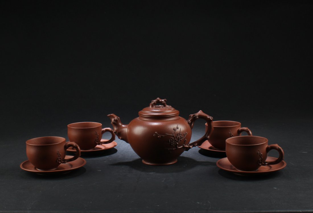 A Nine Piece Chinese Zisha Tea Set (1 of 3)