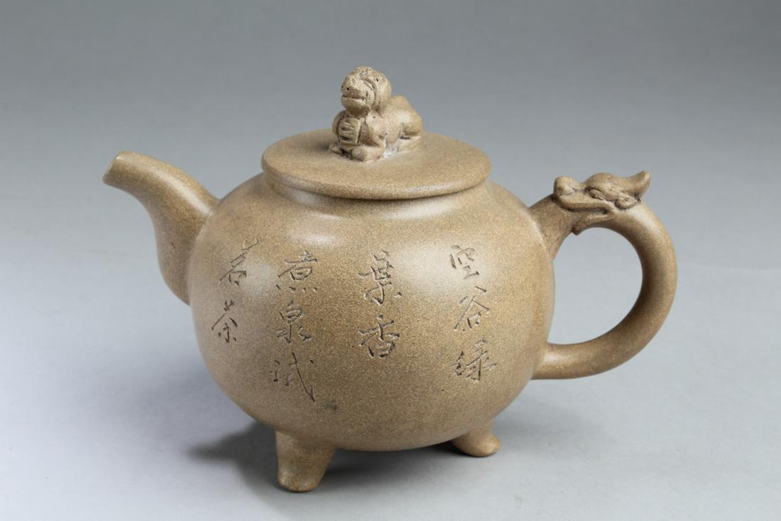 Chinese Zisha Teapot: Chinese Zisha Teapot. Length: 6.75"