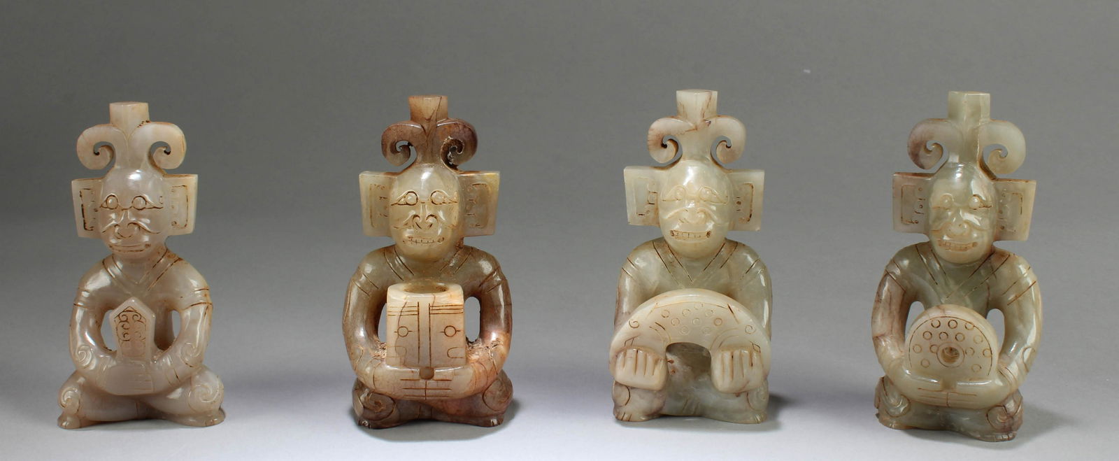 A Group of Four Carved Jade Man Figurine (1 of 2)