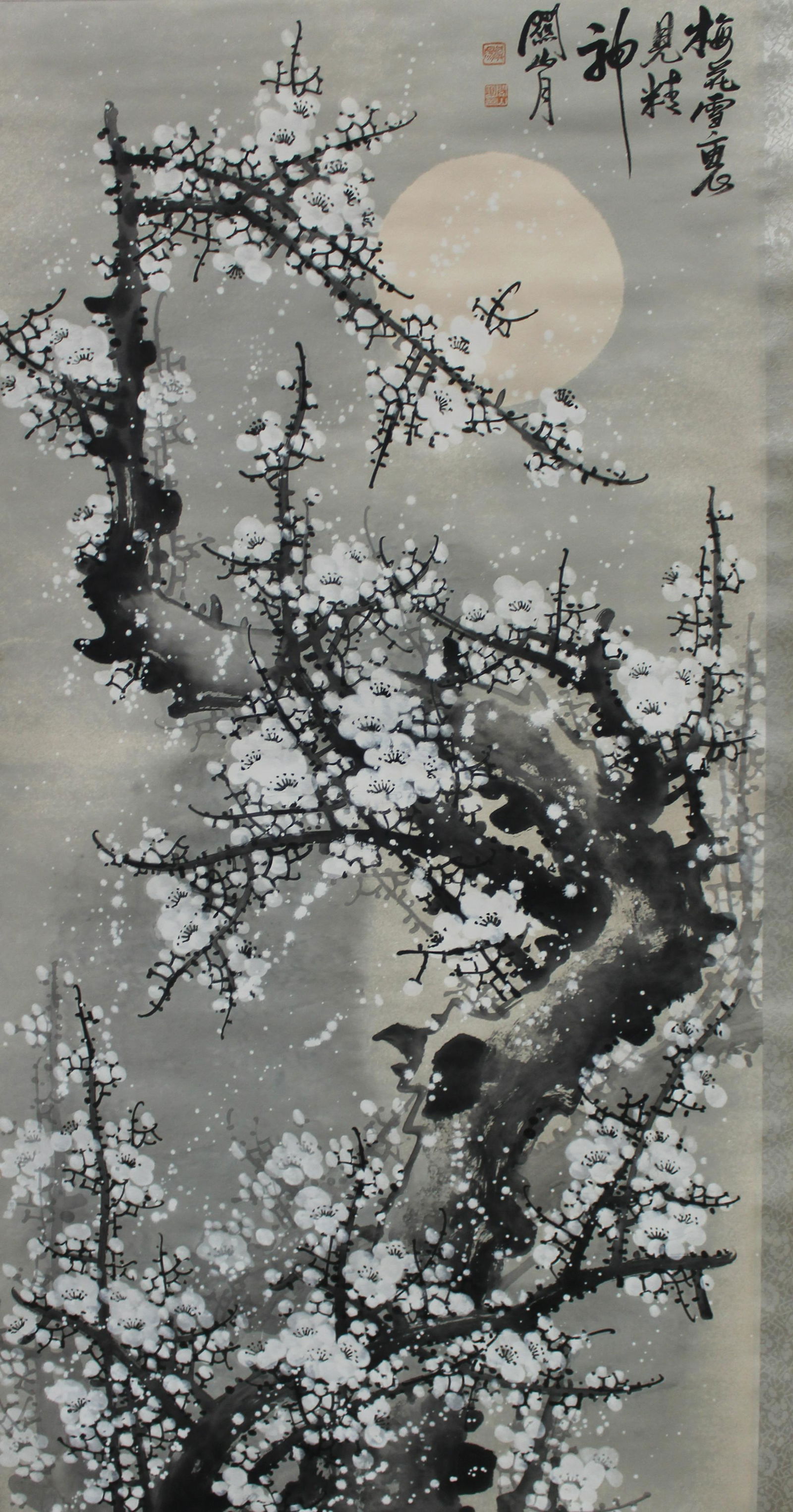 Chinese Hanging Scroll Painting: Ink and color on paper, depicting plums in snow, signed with seal attributed to Guan Shan Yue. Length: 26.25" Height: 53.5"