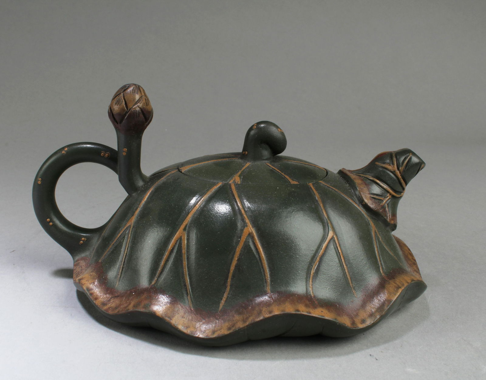 Chinese Zisha Teapot: Chinese Zisha Teapot. Height: 3" Length: 6.5"