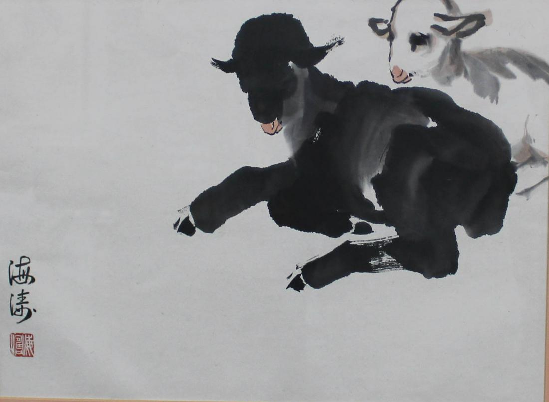 A Framed Chinese Painting: Ink and color on paper, depicting two auspicious sheeps, signature attributed to Hai Tao. Length: 27" Height: 22.5"
