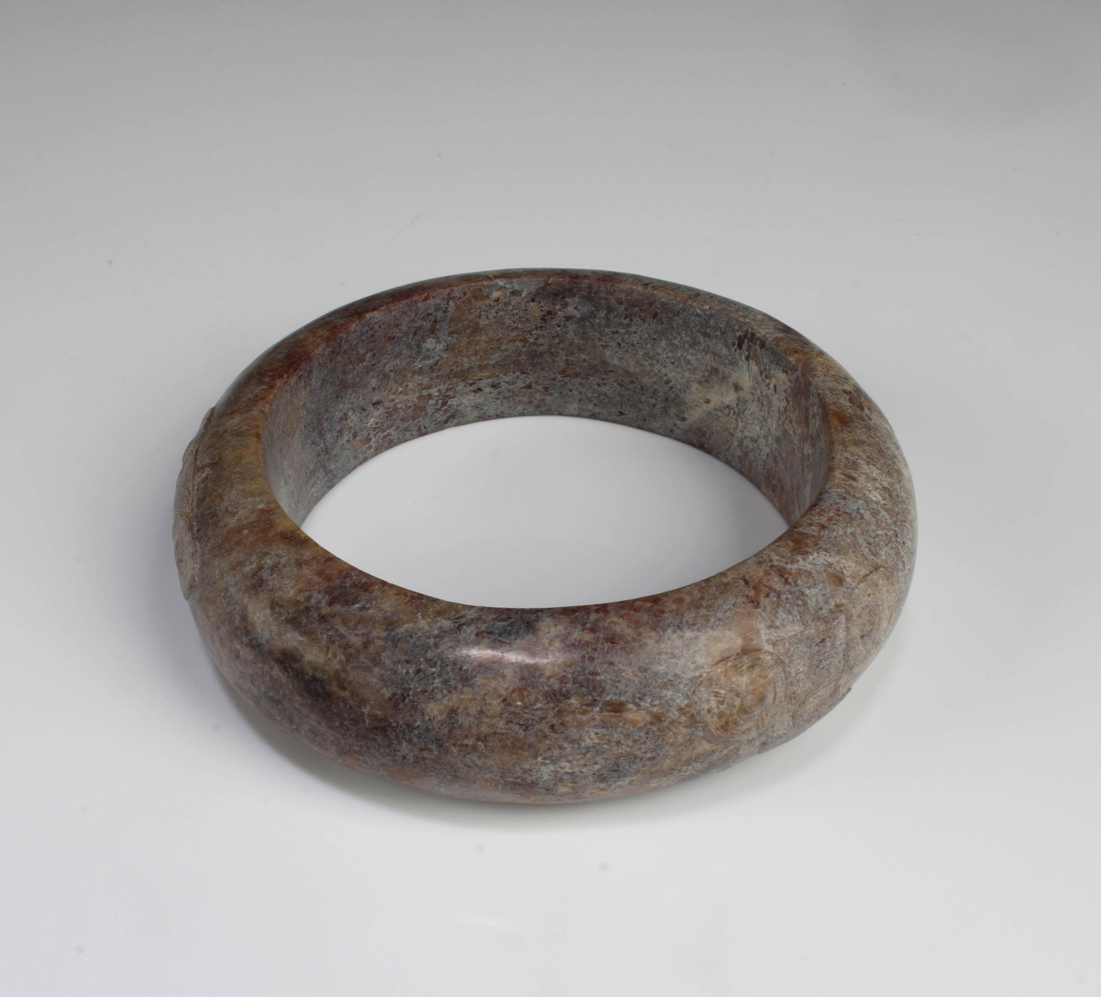 A Jadeite-Like Bangle: A Jadeite-Like Bangle. Inner Diameter: 2.25"
