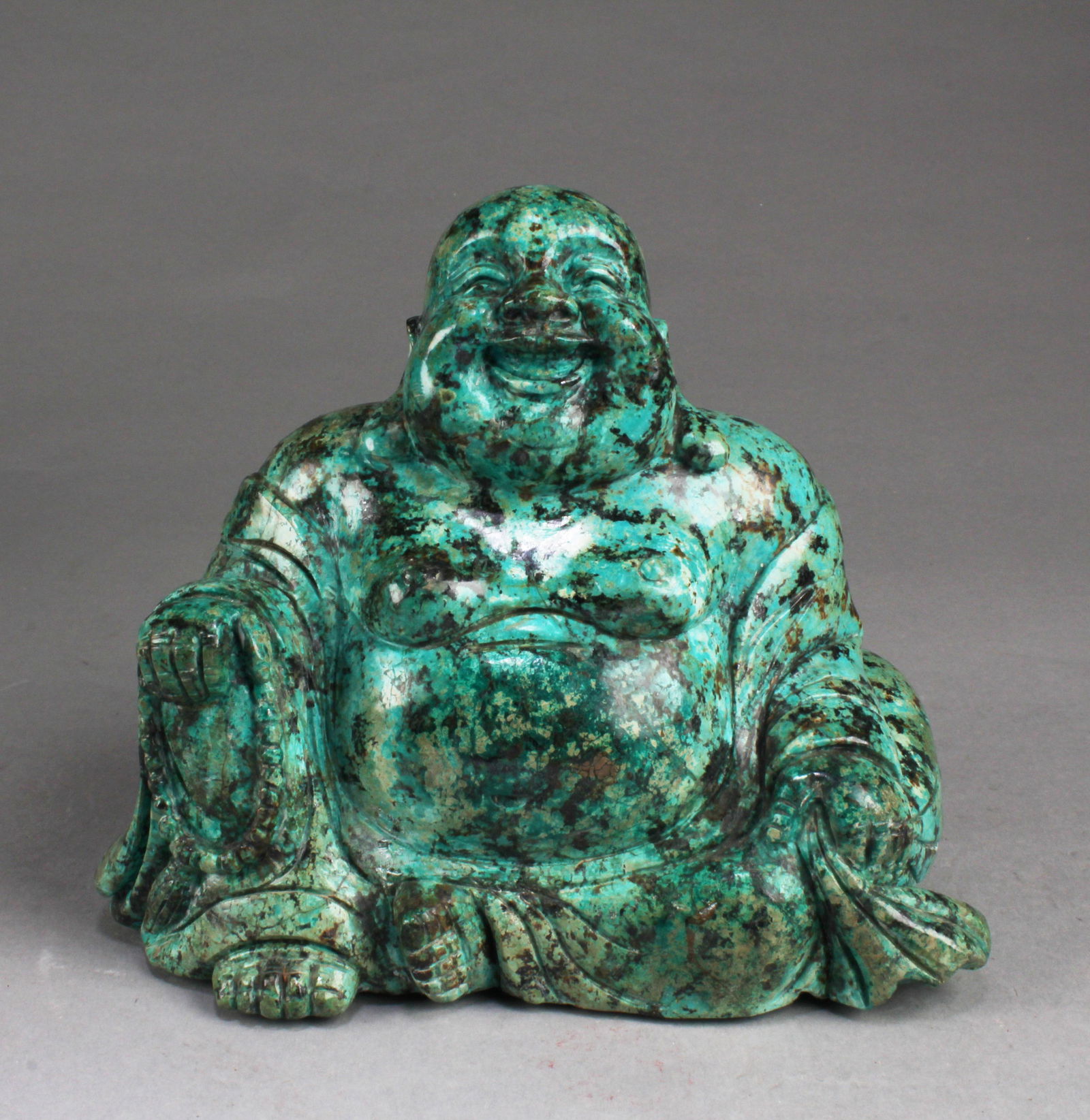 A Turquoise Smiling Buddha Statue (1 of 4)