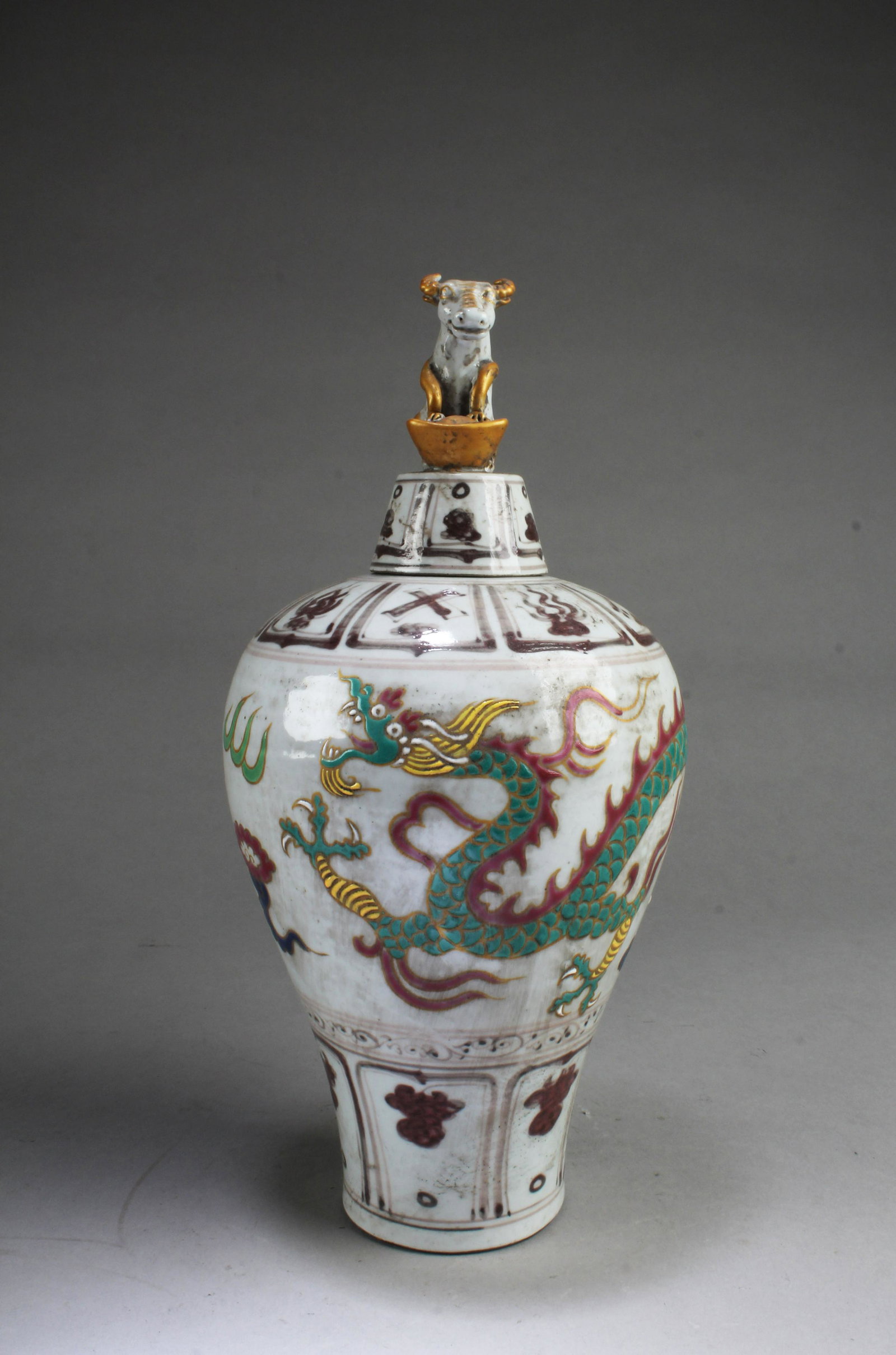 Chinese Porcelain Meiping Vase: Chinese Porcelain Meiping Vase with lid depicting a ox, the body decorated with three-clawed dragon. Height: 13.5"