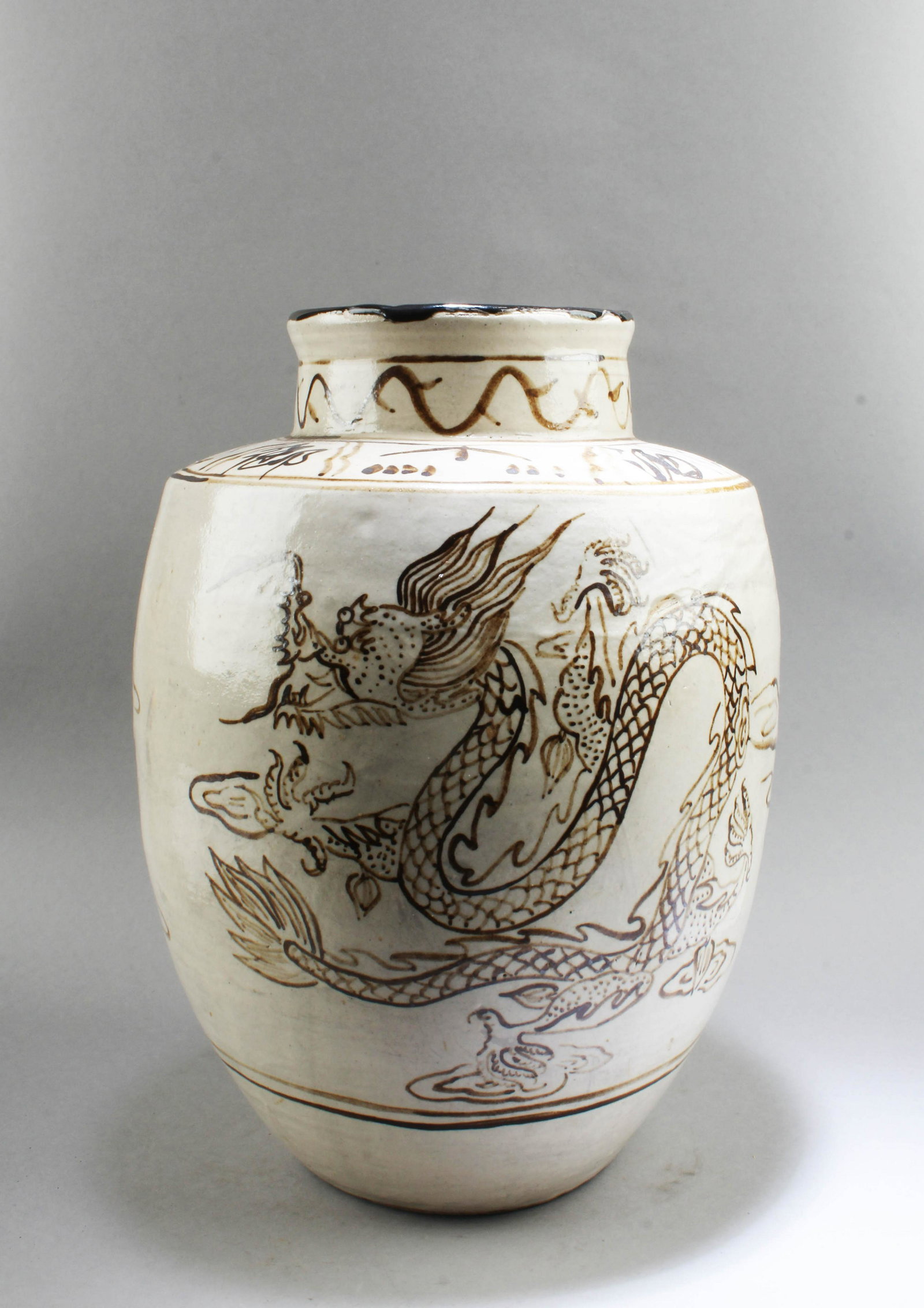 A Potterty Jar: A Potterty Jar. Height: 12.25"