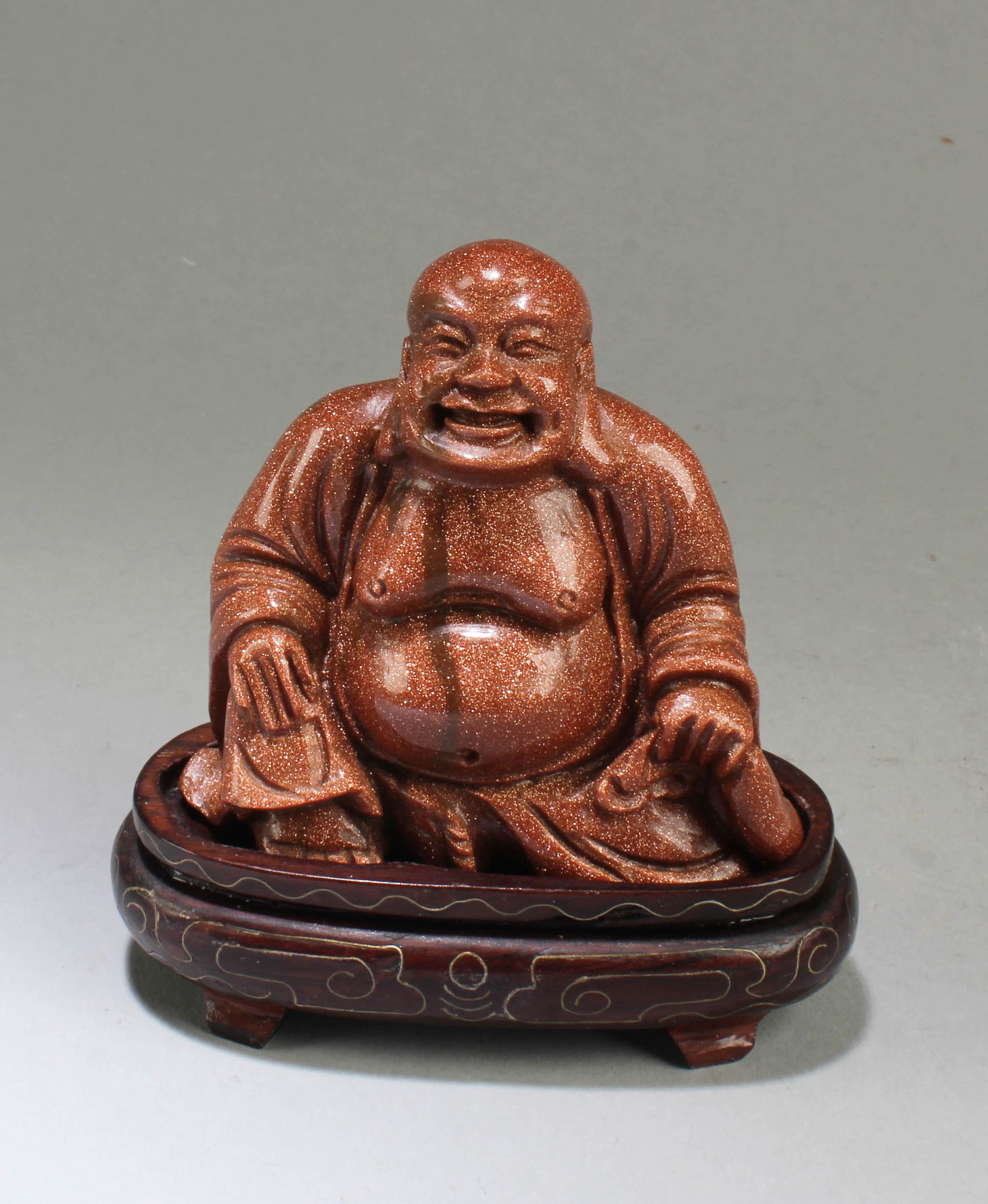 A Carved Gold Crystal Smiling Buddha Statue (1 of 3)
