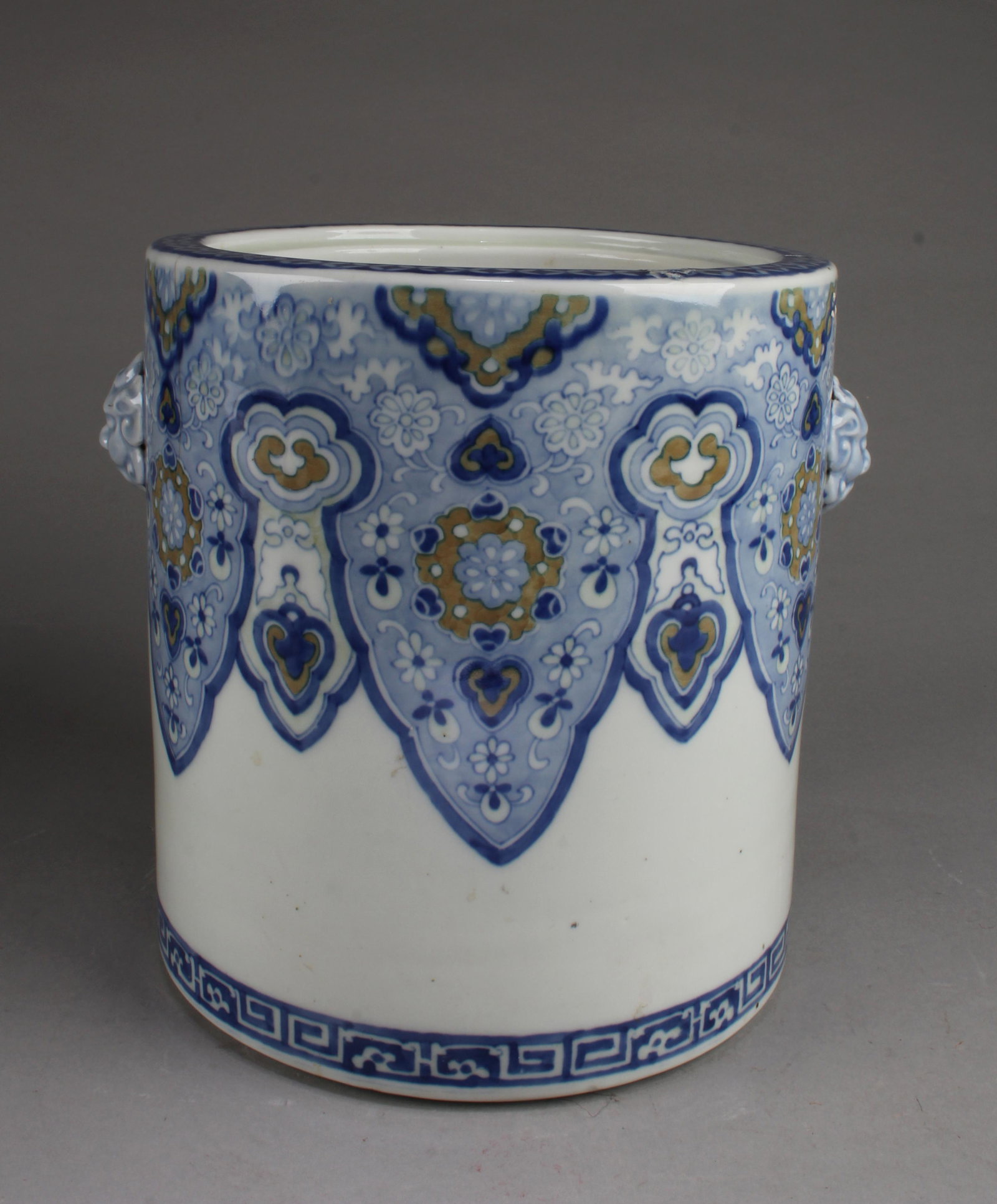A Porcelain Brushpot: A Porcelain Brushpot. Height: 10.25"