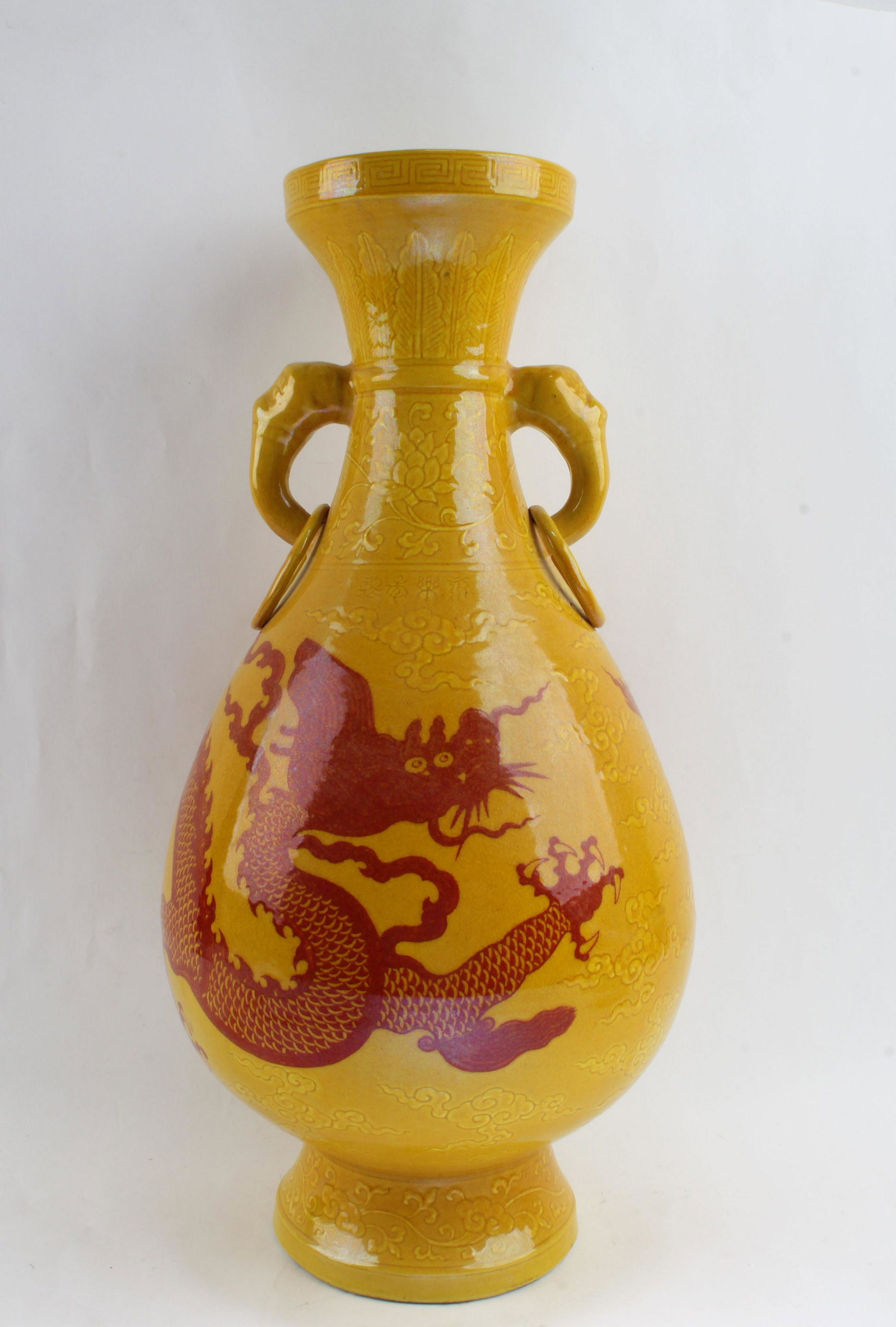 Chinese Famille Jaune Porcelain Vase: Chinese Famille Jaune Porcelain Vase, flanked by twin handles. 'YongLe' mark at base. Height: 19.25"