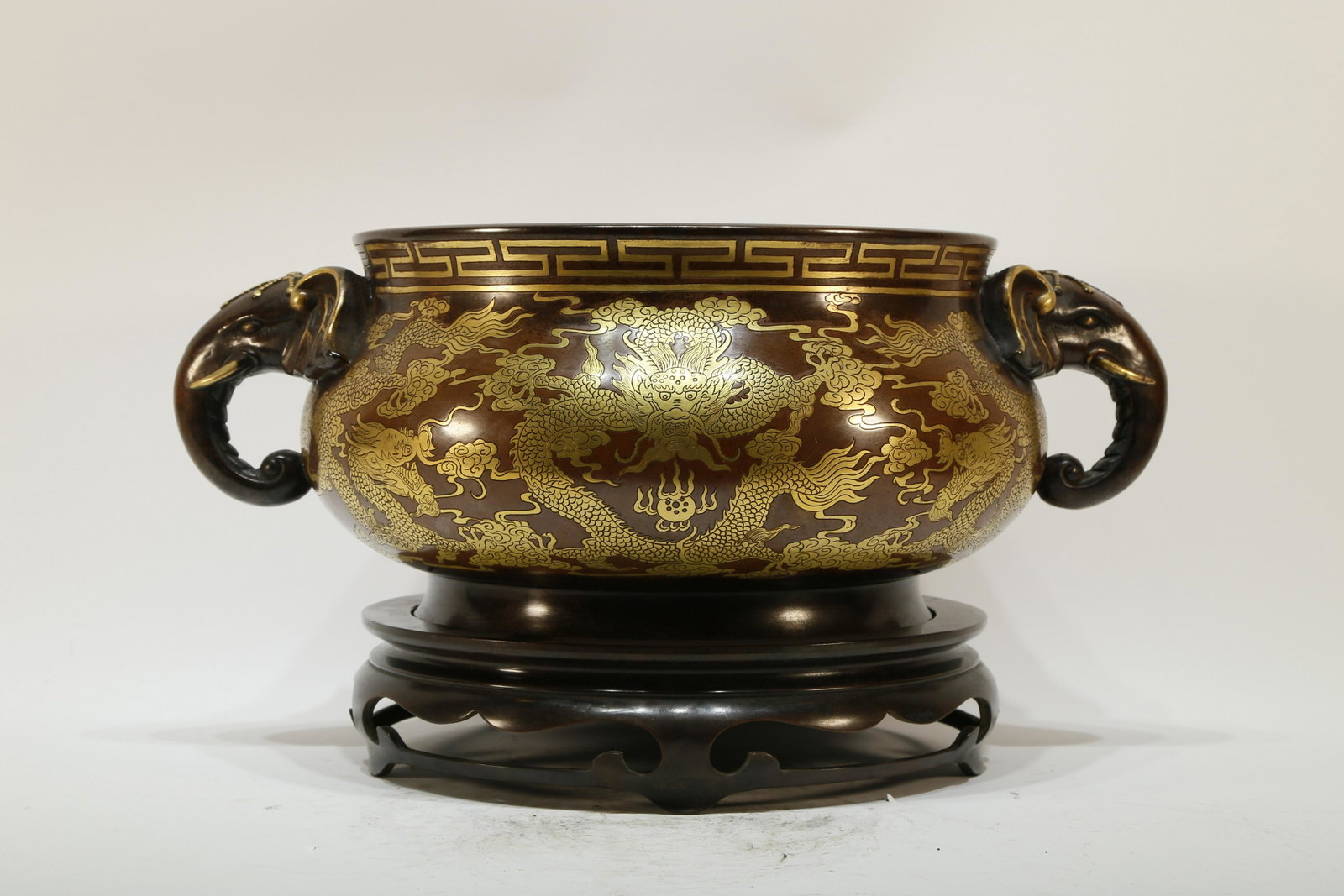 A Gilt Bronze Dragon Censor with Elephant Ears: A Gilt Bronze Dragon Censor with Elephant-Shaped Ears Chinese Ming Dynasty 14-15 th Century Xuande Six Character Mark Size:16.9inx12.6inx9.1in