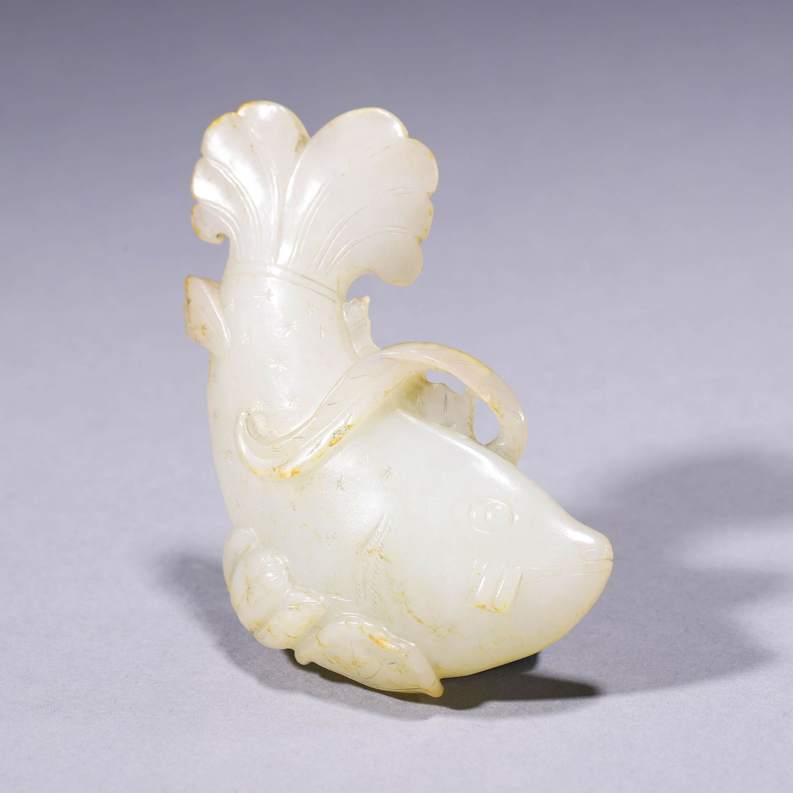 A White Jade Carved Fish Ornament (1 of 8)