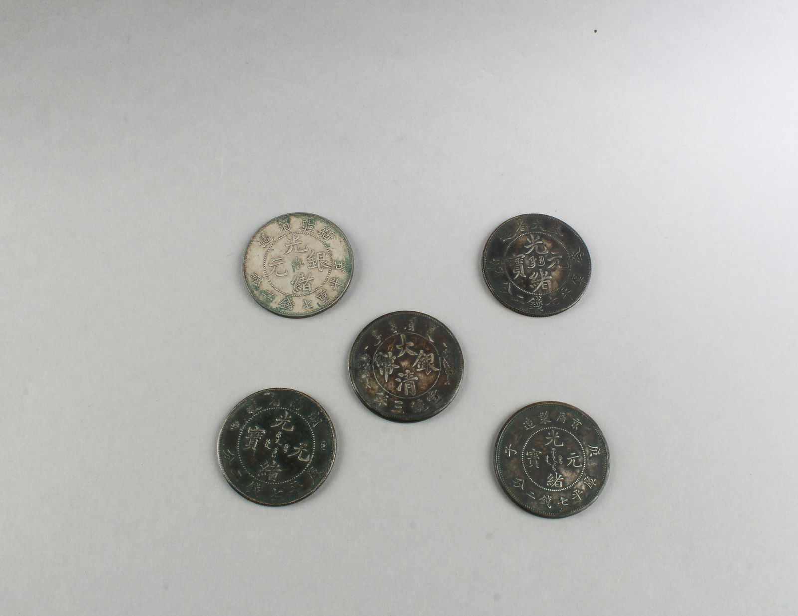 A Group of Five Chinese Silver Coins (1 of 2)