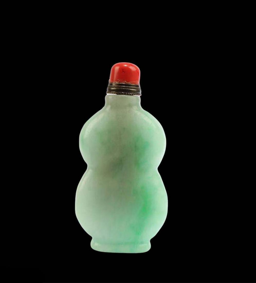 A Carved Jade Snuff Bottle (1 of 6)