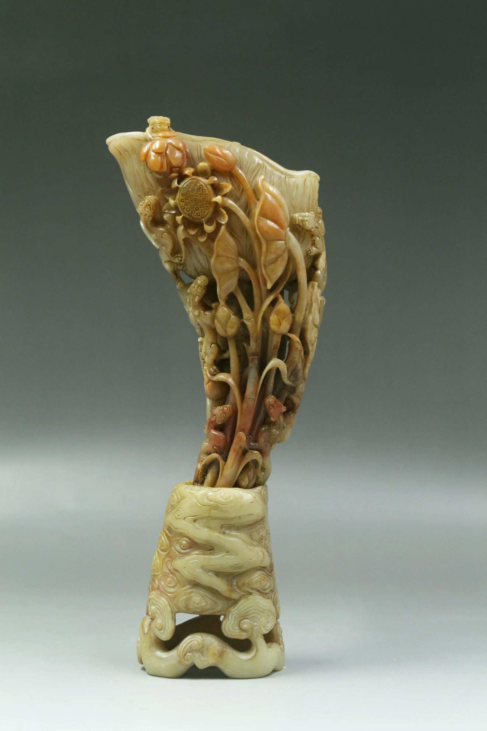 A Carved Shoushan Cup: A Carved Shoushan Cup. Comes fitted with a base. Height: 40 cm (with base)