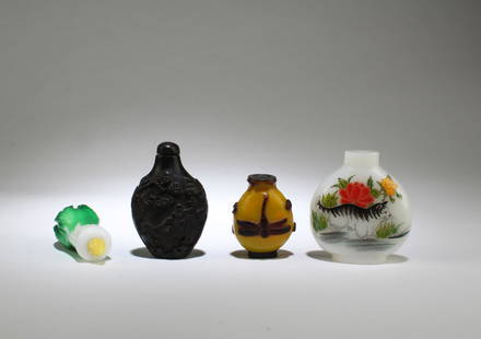 A Group of Four Snuff Bottles: A Group of Four Snuff Bottles. Height: 2.75" (Tallest)