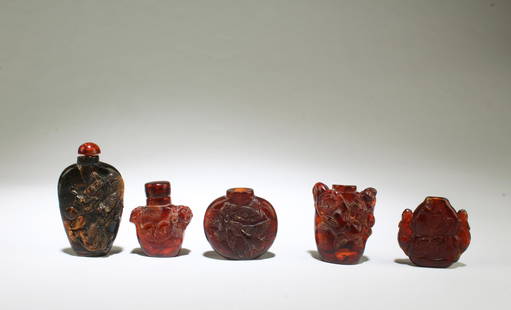 A Group of Five Amber Snuff Bottles: A Group of Five Amber Snuff Bottles. Height: 2.25" (Tallest)